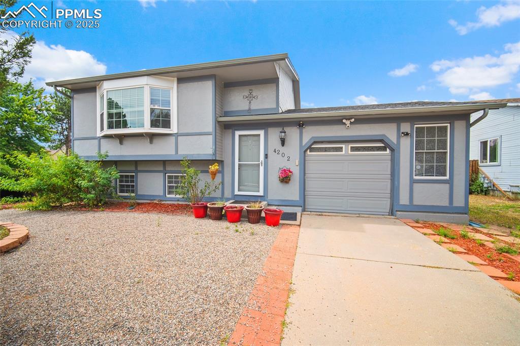 Nestled on a spacious corner lot, this beautifully maintained 4-bedroom, 2-bathroom home offers the perfect blend of comfort, style, and functionality. The updated kitchen features modern finishes and quality appliances, seamlessly flowing into multiple generous living spaces ideal for entertaining or relaxing. Each bathroom has been thoughtfully renovated, offering a clean, contemporary feel throughout the home.

The expansive outdoor space is a true highlight, offering room to garden, play, or simply unwind while taking in the stunning mountain views that frame the property. With its prime corner lot location, ample natural light, and thoughtful updates throughout, this home is move-in ready and perfectly suited for both everyday living and hosting guests.