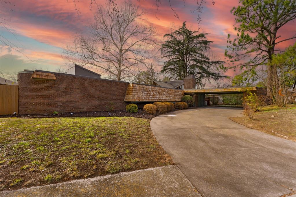 Step into this one-of-a-kind recently restored home to experience a total showstopper! Famous Midcentury Modern architect Dean Bryant Vollendorf built this property in 1971 from his “Skylark” design which features an open concept kitchen and living room with triangular windows and nooks throughout creating a beautiful light-filled space. This home offers 3 bedrooms and 2 bathrooms. You will be captivated by the bright and bold lighting highlighting the unique angular ceilings and semi-circular room designs adorned with cedar details. The color palette of turquoise, burnt ochre, and avocado is reminiscent of 1970s design while still feeling modern and fresh. The organic achitechture of this home was designed with the surrounding landscape in mind. The yard is spacious and provides ample space for living both inside and out. full irrigation system in front and back. This home is unlike anything you’ve seen in Norman! This is home is so special, it was featured in the “Vollendorf in Oklahoma” architecture exhibition at OU in Spring 2026.