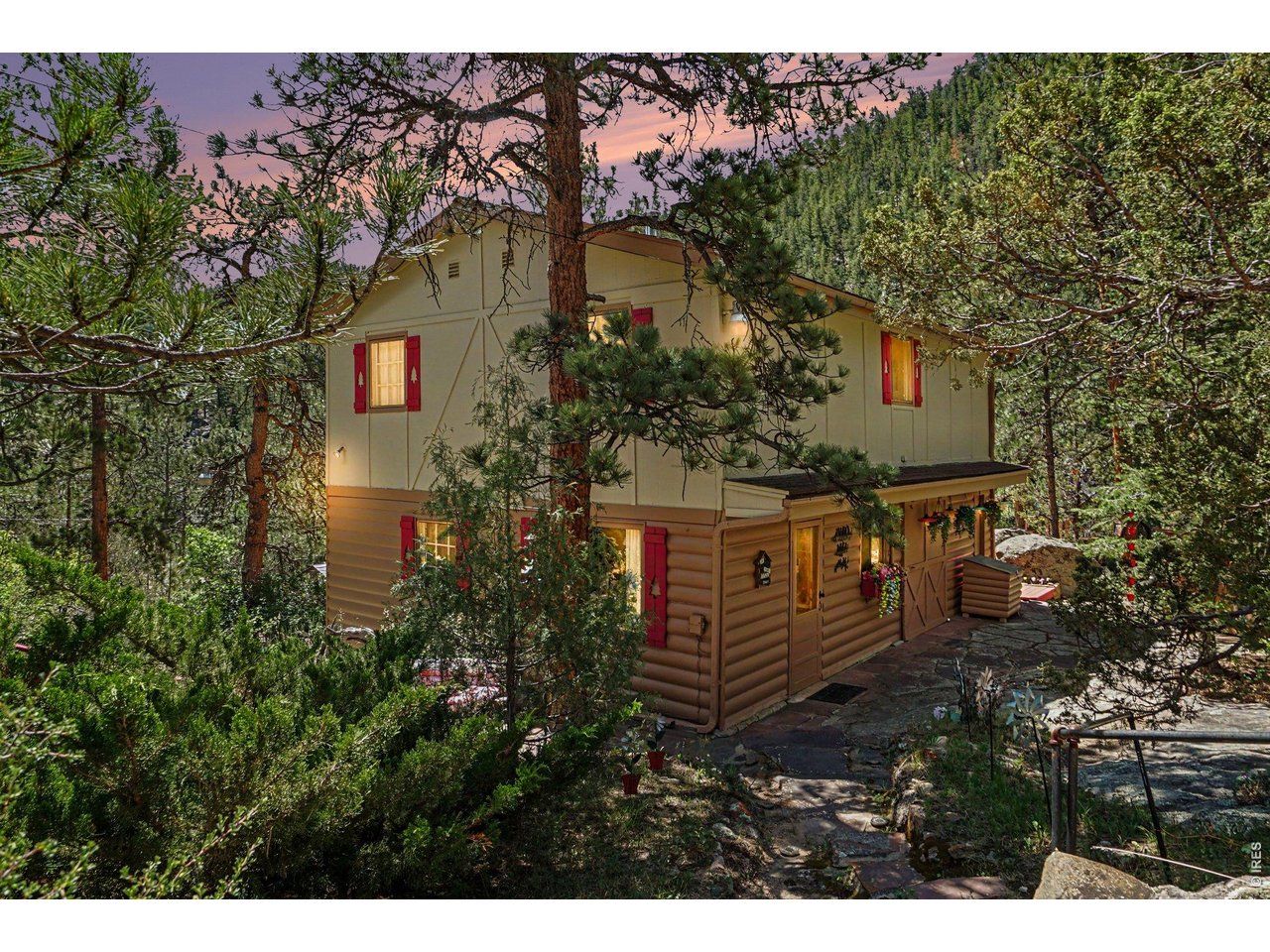 Welcome to Rest-A-While, a charming TURN KEY mountain retreat nestled along the scenic Big Thompson River in beautiful Drake, Colorado. Surrounded by towering rock formations, mature trees, and abundant sunshine, this inviting 3-bedroom, 2-bath cottage offers the perfect blend of historic character and peaceful mountain living.Inside, you'll find warm, welcoming spaces highlighted by an antique wood stove in the family room and a stunning native stone fireplace in the living room, creating the perfect atmosphere after a day of exploring the Rockies. Large windows frame beautiful mountain views while filling the home with natural light.Step outside to enjoy the expansive deck built into the natural rock outcroppings, a spacious stone patio, colorful perennial gardens, and multiple outdoor living areas designed for relaxing, entertaining, or simply listening to the soothing sounds of the Big Thompson River.Whether you're searching for a mountain getaway, or an investment opportunity, Rest-A-While offers an exceptional Colorado lifestyle just minutes from Estes Park, Rocky Mountain National Park, world-class hiking, fishing, and endless outdoor recreation.Come experience the tranquility, natural beauty, and timeless charm that make Rest-A-While a place you'll never want to leave.