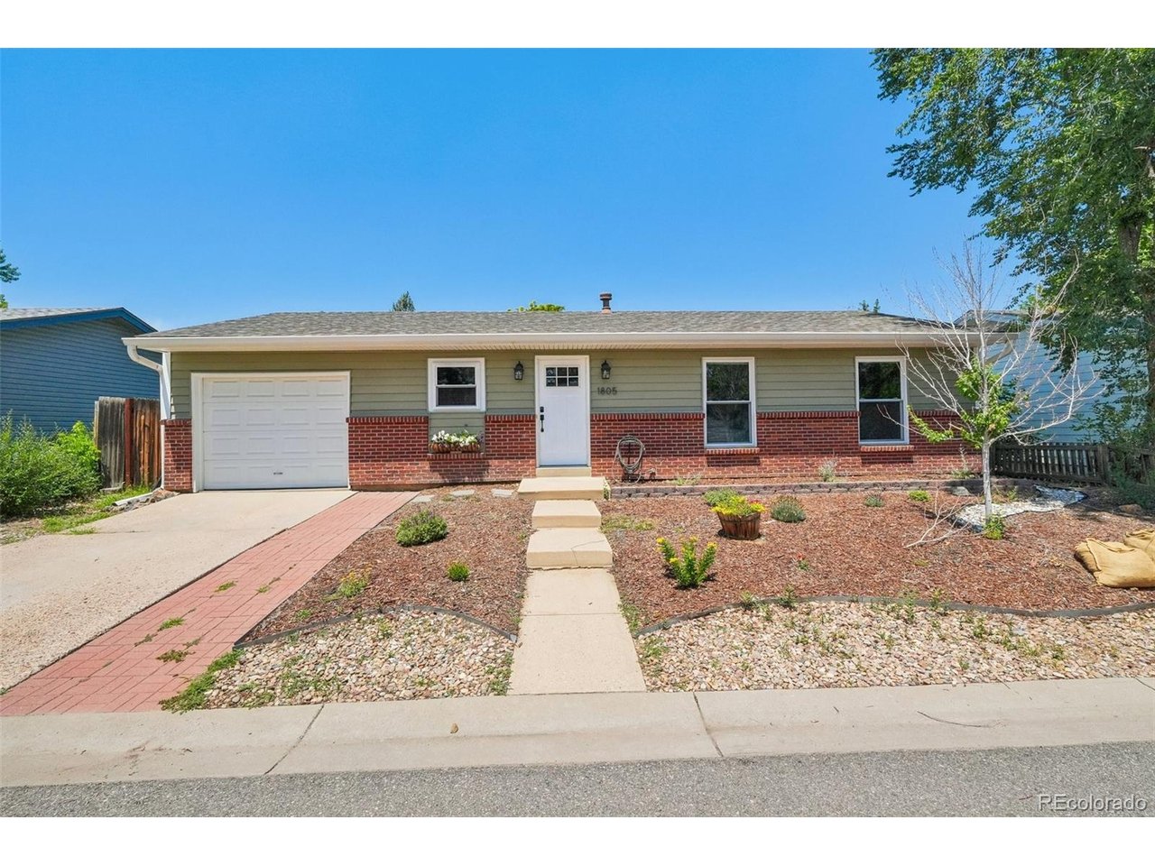 Welcome home to this beautifully updated Lafayette gem! From the moment you arrive, you'll appreciate the fantastic curb appeal, highlighted by a low-maintenance xeriscaped front yard. Major improvements include new siding, soffits, windows, and gutters completed in 2021, a new sliding glass patio door installed in 2022, updated electrical, and a new heat pump added in 2025, providing both style and peace of mind.Step inside to an open, light-filled floor plan where the remodeled kitchen is truly the heart of the home. It features quartz countertops, a butcher block island, stainless steel appliances, and plenty of space for cooking and gathering. The kitchen flows seamlessly into the living room, with a large glass sliding door that opens to the backyard, making indoor-outdoor living and entertaining effortless.The primary bedroom is a warm and inviting retreat, featuring a beautiful custom wood accent wall with built-in bedside lighting. Across the hall, the beautifully remodeled bathroom offers double sinks, a soaking tub, and a stunning walk-in shower with designer finishes. Two additional bedrooms also feature charming wood accent details that add warmth and character.Outside, you'll find an amazing, fully fenced backyard with a spacious patio, storage shed, plenty of room for gardening, and lots of space for kids, pets, or entertaining. The attached extra-deep one-car garage provides additional room for storage, bikes, and outdoor gear.Located just a short bike ride from vibrant Downtown Lafayette, you'll enjoy easy access to restaurants, coffee shops, boutiques, parks, and year-round community events. This move-in-ready home combines thoughtful updates, timeless style, and an unbeatable location.