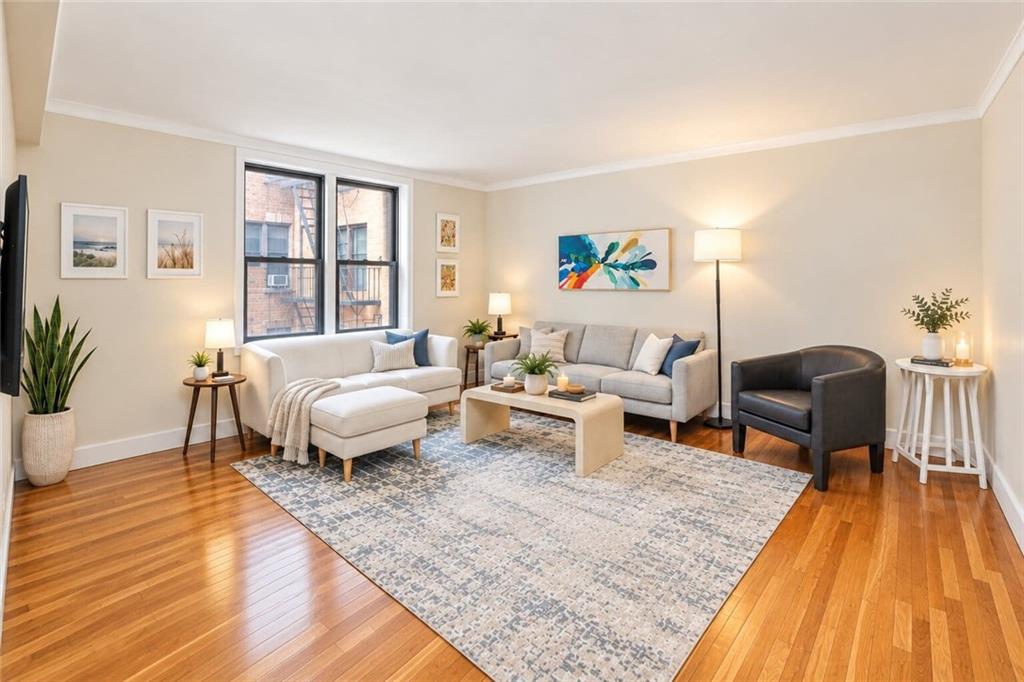 Welcome to 61 Oliver Street, Apt. 2V, a spacious, pet-friendly corner apartment in the heart of Bay Ridge. This approximately 750-square-foot home offers a comfortable layout with a large living room, oversized bedroom, eat-in kitchen, and a versatile home office area. Four huge closets provide exceptional storage throughout the apartment, while six windows bring in plenty of natural light.              The building offers two laundry rooms, a virtual doorman, live-in superintendent, bike parking, additional storage units, and parking available by waitlist. Monthly maintenance is $967.70 and includes heat, water, gas, and real estate taxes.              Ideally located just minutes from beautiful Shore Road, the apartment offers easy access to the waterfront, parks. The express bus to Manhattan is conveniently located nearby, while Third Avenue’s restaurants, shopping, cafés, and neighborhood conveniences are also close by.
