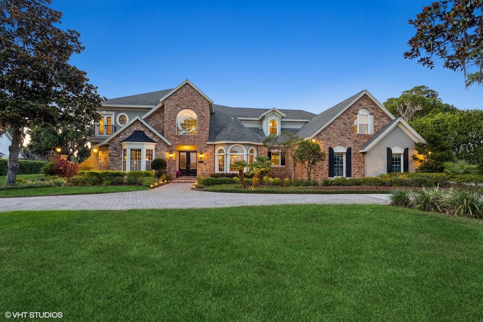 Under contract-accepting backup offers. A RARE FIND between two ski lakes! This one-of-a-kind HIDDEN WATERFRONT GEM is located in transitioning RURAL Lutz within a minimal deed restricted subdivision of three 1-AC homesites & LOCATION 20 mins N of downtown Tampa. This millennial-built home was designed to amplify the ambiance of the ever-changing skies with endless SUNRISES & SUNSETS! Enjoy living a quiet & blissful lifestyle next to nature & ducks, birds, fish, turtles & otters. This property has no HOA fees & is OUTSIDE the 100 ft flood zone & OUTSIDE the high wind zone, thereby lowering home insurance costs.***Amenities include boat ramp access to two lakes, a dock on the N lake with covered boat port & boat lift, a backyard barbecue gazebo and a front gazebo!*** The spacious downstairs master suite includes a bathroom, large enough for a massage table with a jacuzzi, water closet with bidet, automated window treatments & a separate dressing room between two walk-in closets.***Built with a VERSATILE first floor In-LAW SUITE/GAME/EXERCISE ROOM, it also offers an ADA compliant KITCHENETTE with adjacent bedroom & ADA COMPLIANT bath***The original owners take pride of ownership with the Jan/2025 installation of a NEW ROOF (with a 50-year transferable warranty, resistant to winds up to 190 mph), rebuilt dock with manufactured wood. The TRAIN AC units have 10-year transferable warranties. Kitchen has a Bosch dishwasher & Thermador stove top with a June/2025 NEW Kitchen-aid double oven/microwave/air fryer combo.***Upgrades include automated phantom lanai screens, two central vacuum systems for up & down, a soaring 2-story wood burning fireplace, entertainment center with surround sound system, 22ft ceilings with automated chandelier lift, wood sub-floors with 3/4- inch white oak planks which can be bleached or re-stained, two stair-cases & ideal location for an ELEVATOR.***The expansive LOFT can be divided into two rooms with barn doors to separate the billiard/game (or child playroom) to create a separate exercise/office or guest area. Currently the loft has a coffee bar & mini frig for guests.***Well insulated with energy efficient Low E vinyl windows, foam filled block walls & includes a security system with fire, glass & noise detectors.***The secluded homesite’s lot extends to the public road with a 30' X 250' long access road which can be landscaped for privacy & is accessed by 3 homesteads composing Ballinger Estates Subdivision (composed of the original 60’s homesite of the former owner & an all brick estate home on Lot 3 (also used by home on the S side property.***Upon entering the home guests are greeted with EXPANSIVE WATERFRONT VIEWS beyond the den, living/dining room & 2nd story bridge & fireplace. Adjacent to the living room is the family room, kitchen & dinette with its 11+ ft floor-to-glass bay window overlooking the paved lanai, back pergola & barbecue grill area, lake & dock.***The location provides residents a “feel” of living in the country while the property is located in the heart of Lutz & Hills County, minutes from 2+ malls, tons of restaurants, 5-grocery stores, 5 churches & is 5 mins from the new St Joseph’s hospital is W of Cheval & N of Avila Golf & Country Clubs. Only 20 mins from TIA & 30-45 mins from Florida's white-sand beaches. Great opportunity to own a lakefront estate priced $393,00 BELOW available APPRAISAL.