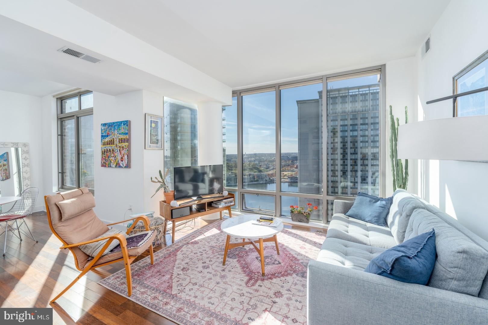 Discover an exclusive Harbor East condo boasting breathtaking water and city views from one of the highest floor one bedroom units in The Vue. This sophisticated one-bedroom, one-bath residence features upgraded flooring and floor-to-ceiling windows in the living room. The gourmet kitchen is equipped with new white quartz countertops, full quartz backsplash, and stainless steel appliances. The spacious primary bedroom suite offers a walk-in closet and stunning water/city views. The luxurious spa bath includes a large walk-in shower and an oversized quartz-topped vanity with 6 drawers. One assigned parking space is included.   Pets case by case.  24 hour notice through 12/15/25 as this unit is tenant occupied.  Available as early as 1/1/26.  Thank you!The Vue condominium is located in Baltimore's most desirable neighborhood, Harbor East, and is just steps from top-tier restaurants, boutique shops, Whole Foods, Starbucks, the Inner Harbor, and vibrant nightlife. Enjoy easy access to the MAC gym and Harbor East Cinema via the building's elevator and enjoy the convenience of being in the center of it all.