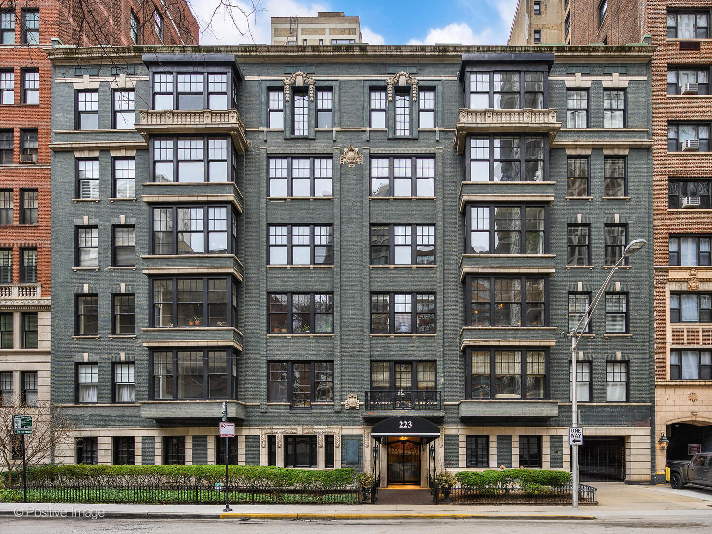 Perfectly positioned in one of Chicago's most prestigious enclaves, this exceptional 3000 sq ft, 3 Bedroom, 2.5 Bath residence is nestled in an impeccably maintained boutique elevator building - offering the scale and privacy of single family living. With soaring ceilings, hardwood floors, expansive windows and a thoughtful layout with an abundance of natural light this place is great for entertaining and everyday living. A grand living room features a French marble appointed fireplace with gas starter. Adjacent is the formal dining room with antique French chandelier and built-in for your formal dinner service. The family room/library also with a beautiful built-in is next to the large gourmet kitchen. Chef's Kitchen with oversized island and breakfast area features custom cabinets, premium appliances, large wine cooler along with a separate wine refrigerator perfect for both entertaining friends and quiet family meals. A separate hall leads to the bedroom wing. Primary bedroom with en-suite green slate tiled bath features a Venetian chandelier and walk in closet/dressing room. The bath features a semi private commode and oversized steam shower.  The second bedroom with a wall of built-ins shares a full Jack and Jill bath with cream marble tile, air jet tub and granite vanity, The office/library on the other side with custom bookshelves and built-in desk makes an ideal work from home space. The third bedroom offers a sanctuary with coffered ceiling. Convenient laundry room with side by side washer and dryer plus a wash sink and ample cabinet storage. Freshly painted with new carpeting. New radiators throughout. Additional storage and assigned  on site parking included with the home. Building provides cable TV/high speed internet, newly outfitted gym, EV charging station, and on-site free guest parking spots. This beautiful midrise building offers unparalleled convenience - close to the lakefront, Oak Street Beach, Michigan Avenue and the city's most celebrated cultural, architectural and dining destinations. Financing allowed.    Experience the epitome of modern elegance in this completely refreshed co-op residence - an impressive place to call home!