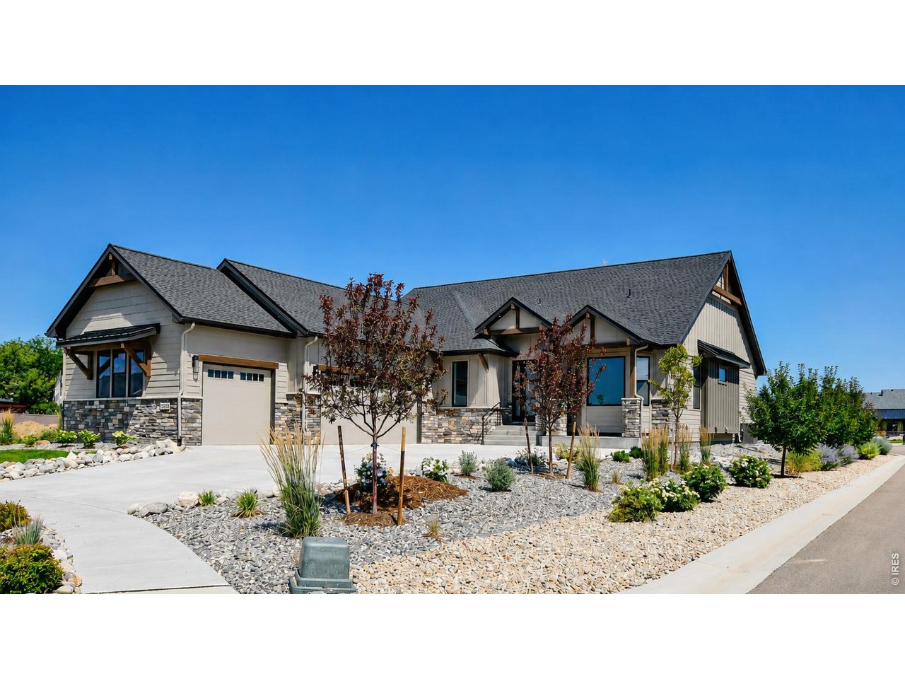 Fully landscaped and move-in ready! Welcome to Harvest Ridge South, a thoughtfully designed community featuring local custom builders and NO METRO TAX. Ridgeway Custom Homes presents its popular Wheatland floor plan, offering modern style, quality craftsmanship, and exceptional attention to detail. This light-filled ranch features 4 bedrooms, 4 bathrooms, a dedicated office, and a rare dual-primary layout with two main-level suites. The chef's kitchen is beautifully finished with quartz countertops, a KitchenAid appliance package, and a spacious walk-in pantry. Quality upgrades include 8-foot interior doors, 10-foot basement ceilings, insulated garage doors, dual tankless water heaters, a custom primary closet system, and a gas line for a future BBQ. The finished basement offers two additional bedrooms, a large family room and rec area, plus rough-ins for a future wet bar and bathroom, giving you room to customize. Complete front and back landscaping is already done, so all that's left is to move in and enjoy!