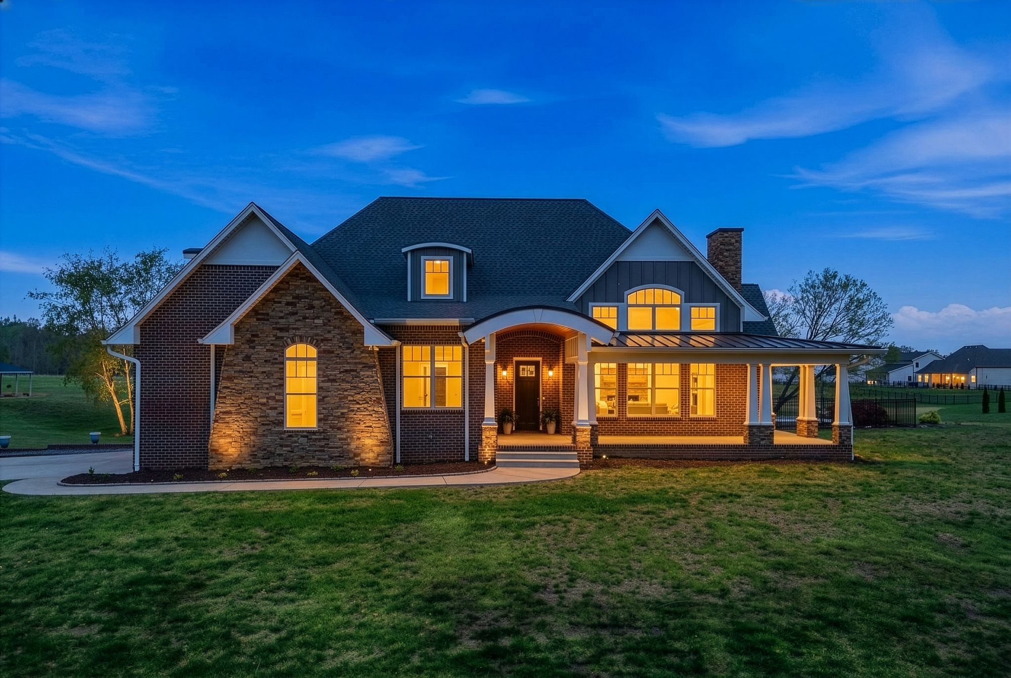 Welcome to a beautifully  designed custom built one owner home on 15.85 rolling acres within Pleasant View. city limits just minutes from parks, shopping, schools, and interstate access.  Offering privacy and a stately presence, this one level home with bonus was designed with ease and comfort in mind.  Loaded with large expansive windows allowing the natural light to flood the space, the soaring ceilings, stone fireplace, and gleaming hardwoods welcome you as you enter the home. Comfort and style fill each room with a separate office space strategically located in a quiet corner with beautiful outside views.  The large kitchen and owners suite offer views of the rolling acreage overlooking a beautiful salt water pool, expansive deck and outdoor fireplace.  Each bedroom offers its own full bath with walk-in showers with the owners suite includes double vanities and a soaking tub. Upgraded appliances, granite tops, expansive kitchen counter space, custom cabinetry, and  a large walk-in pantry make the kitchen a great place for gathering and entertaining. All of this wonderful space is situated over a full unfinished basement area offering room for expansion including a two car garage area in addition to the main level two car garage.  Expansive concrete drive leads to the 30x40 barn with electric offering a place for all the recreational vehicles as well as a lean to for farm equipment.  A must see for the potential homeowner looking for the complete package in a lovely bedroom community located between bustling Clarksville and booming Nashville.