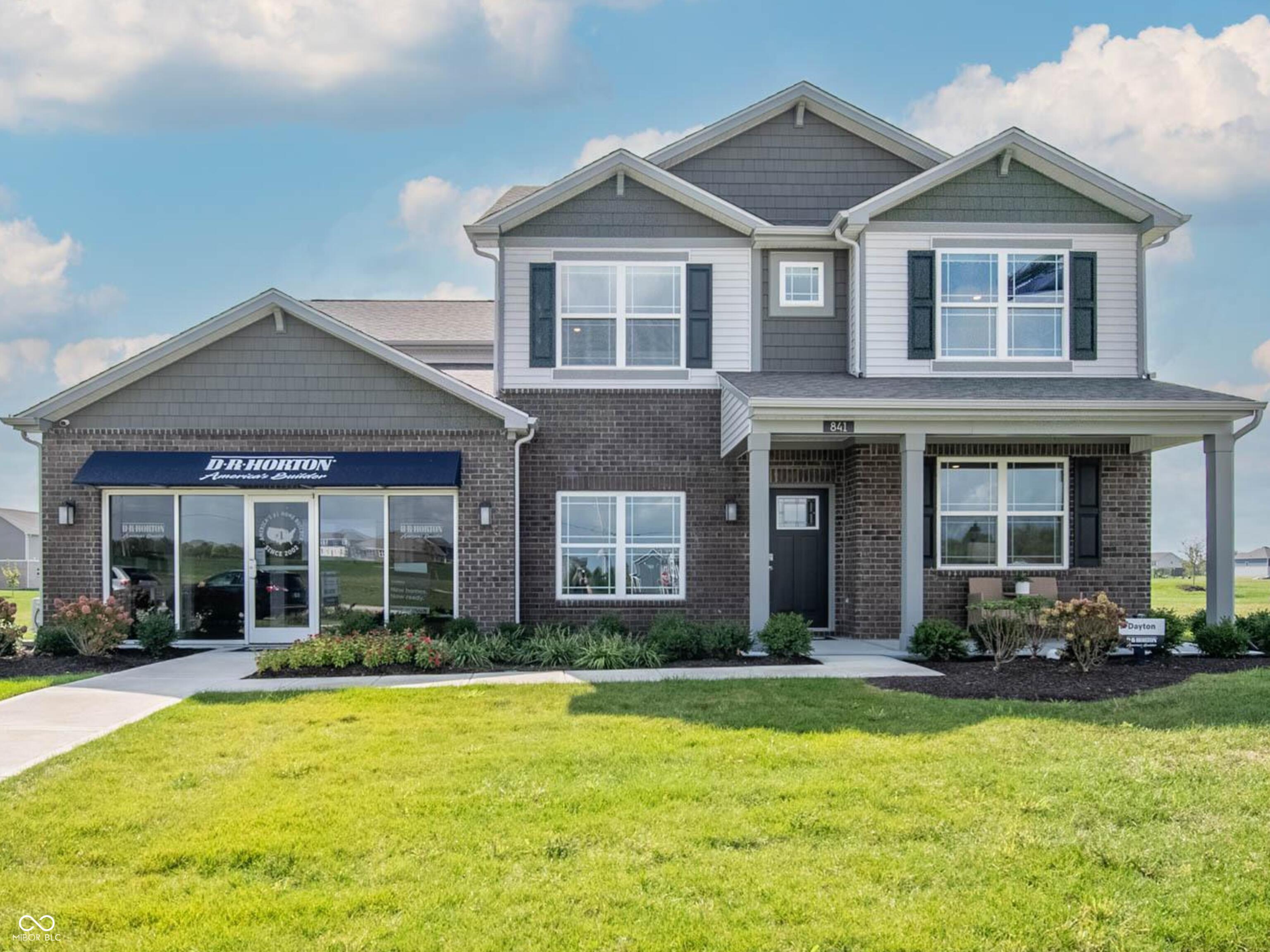 Feast your eyes on the gorgeous Dayton, the former model now available for sale in Saddlebrook Farms. Grand in size and style, the Dayton is 3,388 square feet, 5-bedroom beauty. Open living with an expansive great room, casual dining area and kitchen. The well-designed kitchen is enhanced by a large center island with plenty of countertop and cabinet space, generous walk-in pantry with access to the dining area. The main level also features a flex room which can serve as a home office or kids' playroom. The extra spacious main level bedroom and ensuite bathroom is superb for guests or multi-generational living! The amazing primary bedroom suite is completed by a generous walk-in closet and roomy ensuite bath with dual-sink vanity, luxe shower, linen storage, and private water closet. Overlooked by a sizable loft, secondary bedrooms feature ample closets. The hall bath features a dual-sink vanity and private commode and shower space. Additionally, the laundry room is conveniently located on the upper level. All D.R. Horton homes come with America's Smart Home Technology, an industry-leading suite of smart home products that keep you connected with the people and place you value most. Take some time out to enjoy the community walking trails, playground, green space and the pond with a serene fountain. Saddlebrook Farms offers the peacefulness of a small town and the convenience of living near major road thoroughfares such as I-65 and US-31 for easy commutes. Explore local parks, eateries, retail establishments, golf courses and more in the area.