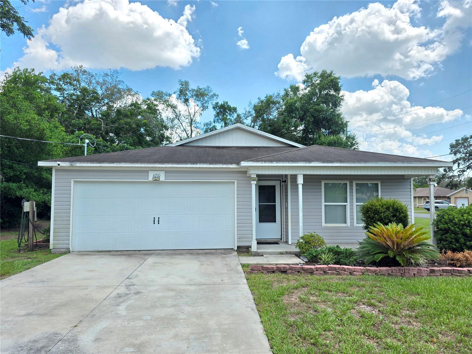 Like New Interior Spring Hill 3 Bedroom Home 2 Full Bathrooms And A 2 Car Garage- Enter The Home From The Front Porch- New Stainless Steel Appliances In The Eat In Kitchen, Dual Sinks, Breakfast Bar And A Walk In Pantry- Formal Dining Room- Great Room- The Primary Bedroom Has A Walk In Closet, Dual Sinks, And A Tub Enclosure- Screened Porch Plus A Covered Open Patio- Interior Paneled Doors- Inside Laundry Area- New Extras Include Ceiling Fans, Carpeting, Luxury Vinyl Plank Flooring, Light Fixtures With Dimmers, Sun Blocker Curtains, Interior Freshly Painted, Water Heater, Open Floor Plan Call Today For A Showing.