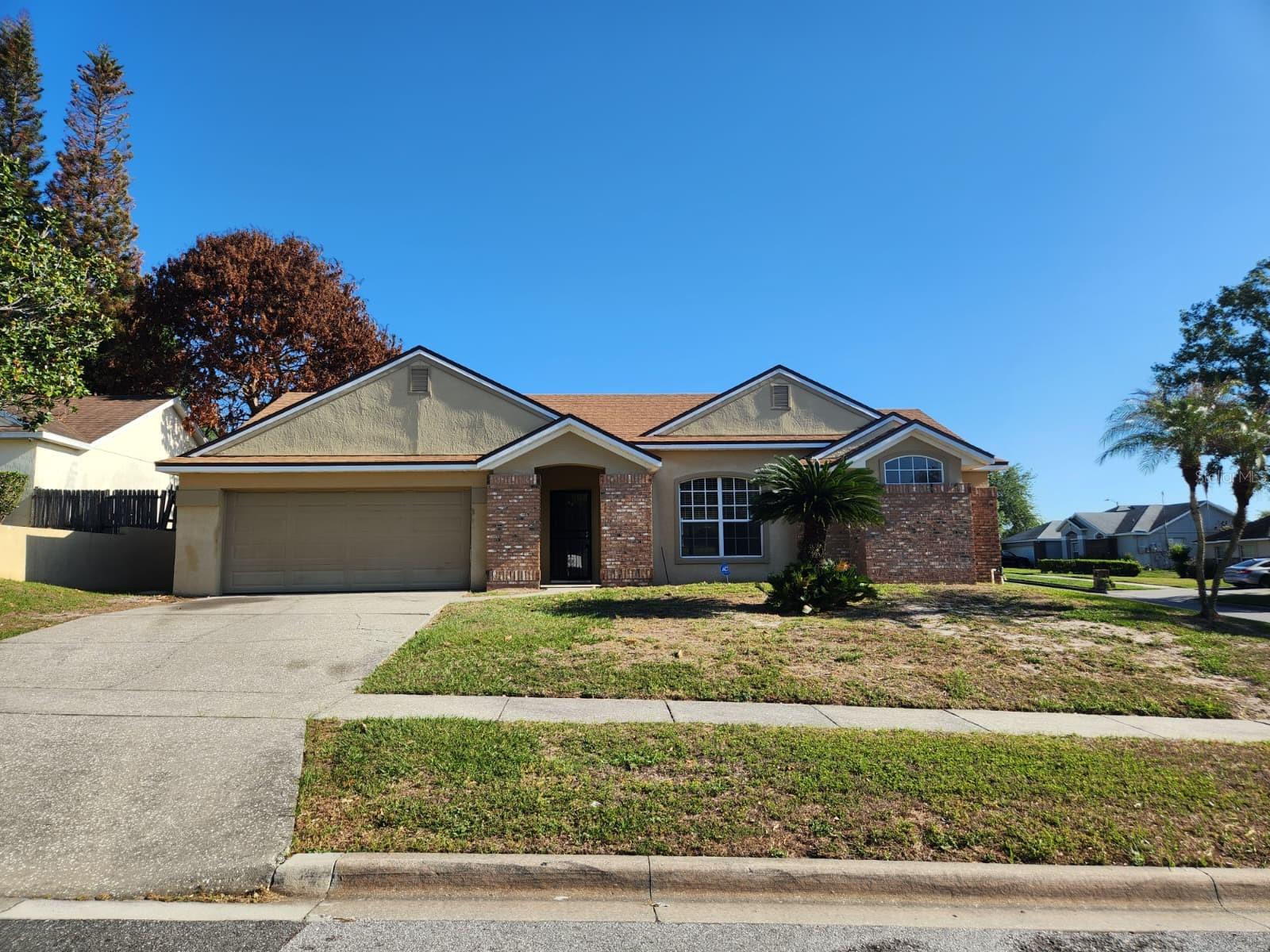 Well-located 3-bedroom, 2-bath home with a 2-car garage, situated on a quiet street with a cul-de-sac at the end, within an established Orlando subdivision known for larger lots, mature landscaping, and consistent resale activity.The home offers a functional layout with comfortable living space and solid overall condition. Interior would benefit from cosmetic updates to align with surrounding homes, but does not require major renovation. A great fit for a buyer looking for a home they can move into and update at their own pace. Thoughtfully priced for a buyer seeking value in a well-established neighborhood.Positioned on a spacious lot, the property is conveniently located near shopping, dining, and major roadways, providing easy access throughout the Orlando area. Nearby schools, parks, and everyday conveniences further support the location’s appeal.
