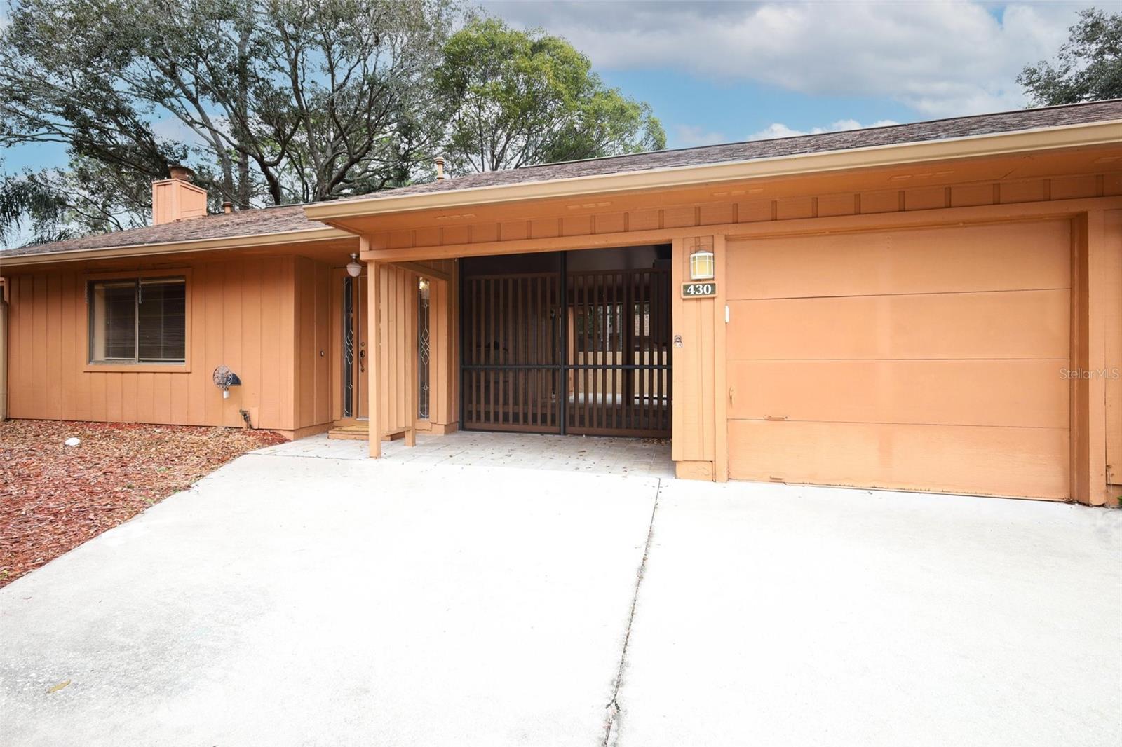 Welcome home to this adorable 3-bedroom 2 bath patio town home nestled in the charming Pine Tree Village Community in desirable Deer Run.  The home is light and bright with lots of windows.  The cozy living room boasts hard wood floors, vaulted ceiling with wood beams and a cozy wood burning fireplace. From the kitchen/dining area walk through sliding glass doors onto a large private screened porch perfect for entertaining.  The good-sized primary bedroom has a walk-in closet and a small private courtyard - a wonderful spot to enjoy your morning cup of coffee.  The well-maintained community includes a clubhouse, community pool, and tennis/pickle ball courts for your enjoyment. Plus, the location is ideal with easy access to shopping, entertainment, and major roads such as 436 and the 417 along with outstanding Seminole County Schools.  Come take a look at this lovely home and don't miss the opportunity to make it your own!