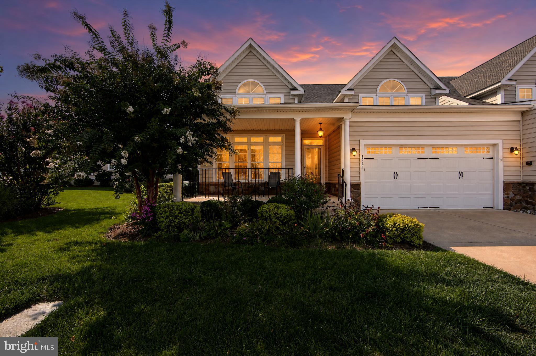 Immediate Possession Available for this upgraded carriage home with a three stop elevator in Coldstream Crossing! Combining convenience with luxury, the main floor is comprised of an office or formal living room with wainscoting and crown molding, elevator access, powder room, laundry room, gourmet kitchen with a large island with granite countertop, soft-close cherry cabinets, stainless appliances, dining area, a huge great room, sunroom and a large master suite. Hickory flooring, wainscoting, crown molding, a custom, stacked stone gas fireplace flanked by built-ins, coffered ceiling in the master bedroom and two walk-in closets, are just a few of the upgrades. The large deck off of the sunroom overlooks a lovely greenspace and has a retractable awning for shade and privacy. Take the elevator or wide staircase to the second floor for three more bedrooms, plus a partially finished storage room, which could easily be another bedroom, office or studio. A full, tiled bath serves the second floor bedrooms and all bedrooms have ample closet space. A huge, full basement with high ceilings is your final elevator stop. Two car attached garage, tankless water heater and dual zoned HVAC.