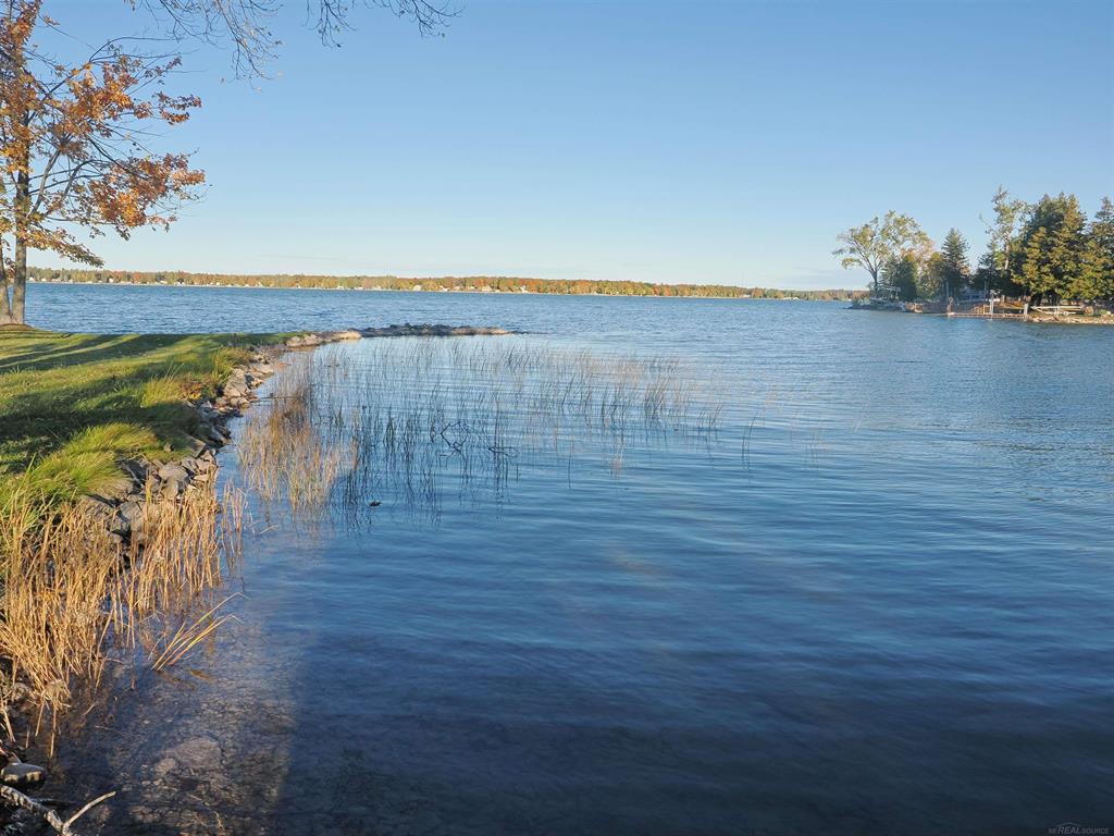 This affordable Long Lake cabin gets you direct water frontage at an attainable price. The cabin is 2 bedroom and 1 bath and while dated is fully functional. Long Lake is  one of the more sought after lakes in the Northeast Lower Peninsula. Long Lake is 5652 acres in surface area and 25 feet deep through most of the lake. The lake is stocked regularly with walleye and walleye are the most targeted fish here. The lake is great for skiing and tubing in the middle and south portions while the northwest portion tends to be a little quieter and great for fishing and paddling. The cabin is located near the center of the lake on a small bay providing protected waters for paddling and swimming and also a protected docking space helping to protect your boat from the wind and waves. The cabin has a large lake side yard and a 24x24 garage.