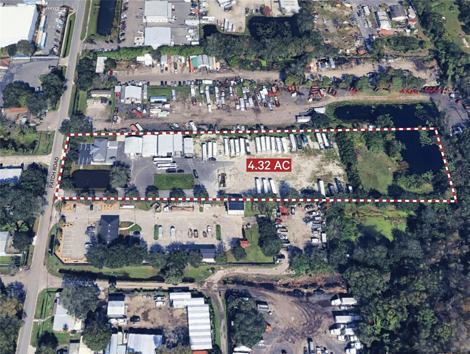 4.32 acres of industrial land and Buildings in Orlando, Florida. The property is zoned IND-1/IND-5 and is located 4.7 miles from Orlando International Airport. This property offers superb access to major highways like SR- 528 and SR-417, facilitating easy commuting and logistics management. Its strategic location in Orange County enhances its value, making it an ideal choice for establishing a successful commercial operation in a well-connected area close to amenities. Property Highlights Office Building 1,436 Sq Ft w/ Bathroom + Parking 8 Spaces (1) Handicap, Four Steel Buildings   Two (2) Dock Doors, Repair Facility for Truck/Buses, Electricity, Exhaust & Interior Fans for ventilation+ LED lighting paved and graveled Outdoor Storage Yard