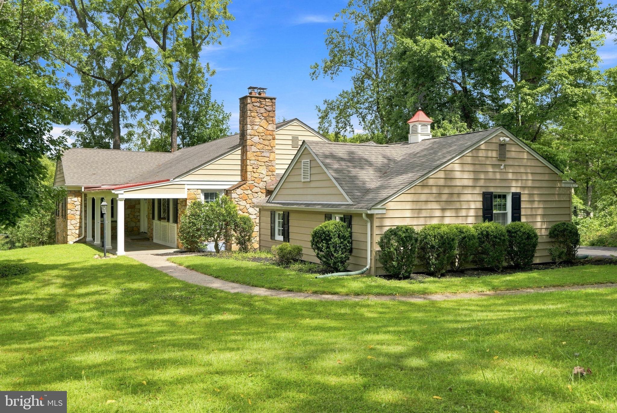 Welcome to 905 Newtown Road! A beautiful residence situated on a premier lot in the heart of Devon. Located within the top-rated, nationally acclaimed Tredyffrin-Easttown School District, this stunning home offers an exceptional blend of sophisticated updates, expansive space, and an idyllic, maturely landscaped setting that feels like a private retreat. Fully engery efficient!  Step inside to discover a bright and thoughtfully designed interior featuring a mix of rich hardwood flooring and plush carpeting. The expansive floor plan includes a spectacular primary suite addition complete with a soaring cathedral ceiling, a cozy fireplace, custom walk-in closets with built-ins, and a luxurious, spa-like primary bath. A main-floor laundry room adds ultimate everyday convenience to the layout.  The living space extends to a beautifully finished walk-out lower level, boasting crisp drywall finishes, abundant natural light, and a custom full bathroom with a meticulously tiled shower. This versatile lower level opens directly to the outdoor spaces, creating a seamless transition for entertaining or relaxation.Additional highlights include a spacious 2-car attached garage.  Outside, the property showcases a sweeping yard surrounded by mature trees and new plantings, providing a serene backdrop for outdoor living. Enjoy the peaceful, neighborhood feel of Easttown Township while remaining just minutes from the shopping, dining, and transit options of the historic Main Line. This turnkey, HGTV-worthy home is completely ready for its next owners.