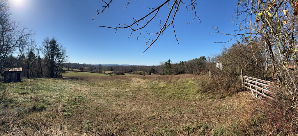9.681 Acres of Farm & Pasture Land – Hillsville, VA Discover the perfect blend of country charm and convenience on this 9.6-acre property featuring rolling pasture land, a peaceful running stream, and beautiful mountain views in the distance. This property offers multiple building opportunities, including a septic system already in place from a previous mobile home site and public water access available. Outbuildings include a hay barn and two additional barn/wooden outbuilding structures. Whether you're dreaming of a mini farm, a private retreat, or a home with sweeping mountain scenery, this property offers the space, setting, and serenity you've been searching for.  Located just outside Hillsville — convenient to town, shopping, and I-77 access. Public water available Existing septic system Barns and pasture ready for livestock