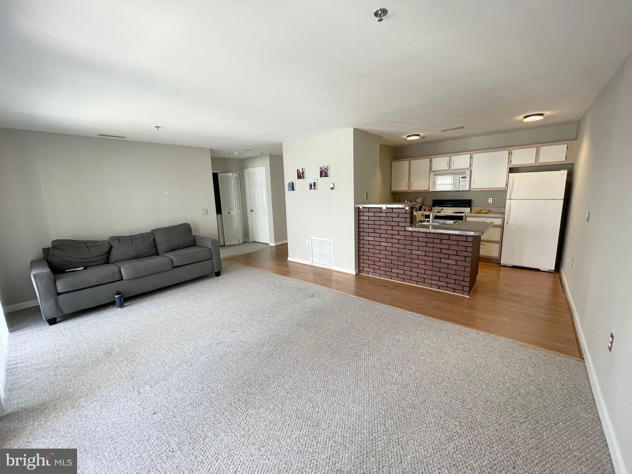 Carefree living in a secure building with parking in the heart of Canton. Well maintained unit with balcony and in unit laundry. Building sits on Canton waterfront & promenade. Includes a fitness center, 24 hour security with front desk and secured doors. 1 car parking in secure garage. Close to Canton square, Safeway, bars & restaurants, community pool, gyms, etc. Renters Insurance Required.