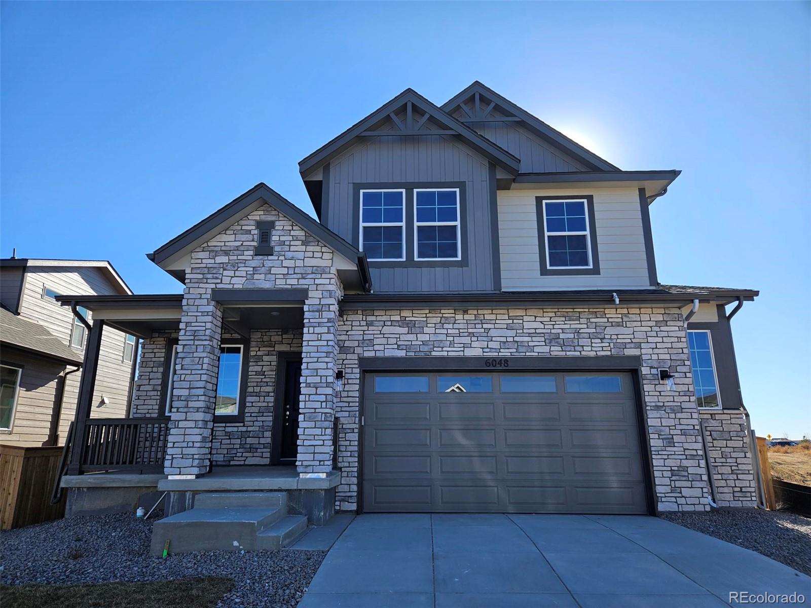 Gorgeous two-story home showcasing standout architecture and an attractive stone exterior, featuring one of the community’s top-selling floor plans for its thoughtful and functional design. A welcoming covered front porch sets the tone as you enter.Just off the foyer is a private pocket office, ideal for remote work, studying, reading, or a hobby space. The open-concept main level seamlessly connects the kitchen and great room, creating an inviting layout perfect for everyday living and entertaining. Abundant windows throughout the home provide excellent natural light.The kitchen offers an oversized island, ample cabinetry, a corner walk-in pantry, quartz countertops, and a gas range with upgraded electrical and pre-wires. Luxury vinyl plank flooring enhances the main level, with plush carpet upstairs for added comfort.The mudroom features a built-in bench for convenience, while the oversized two-car garage provides generous space for parking and storage with room to open car doors comfortably.All bedrooms are located on the second floor, along with the laundry room and additional hallway storage. Both the primary and secondary bathrooms include dual sinks and linen closets, offering practical storage and everyday functionality.Situated in a charming small-town-feel neighborhood in Brighton, this home is conveniently located just minutes from groceries, retail, restaurants, entertainment, recreation centers, and Barr Lake. Enjoy easy access with only a 30-minute commute to DIA and downtown Denver.Residents also enjoy a neighborhood park featuring a playground, swings, picnic tables, shaded seating areas, BBQ grills, dog stations, and expansive open green space—perfect for relaxing and gathering.