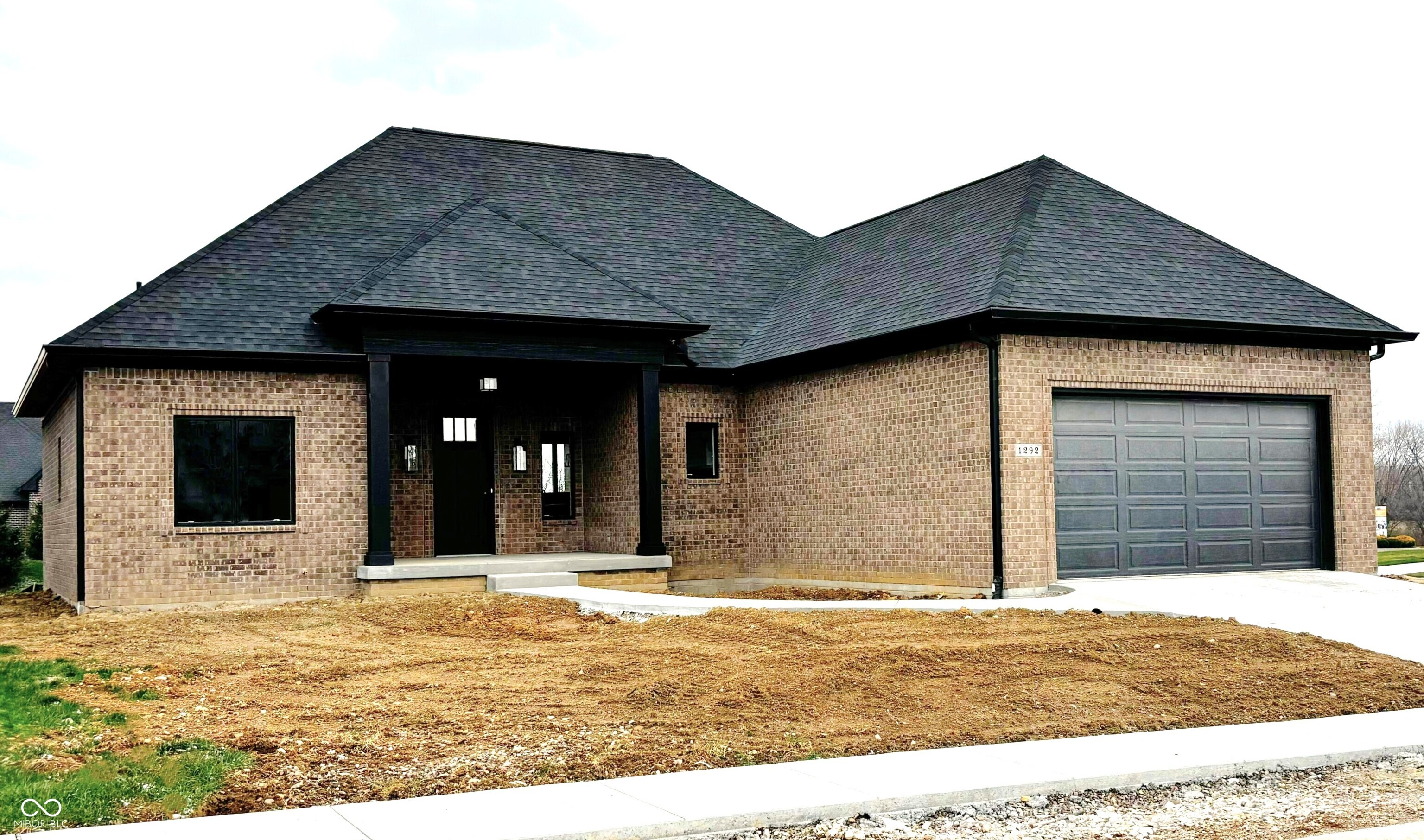 EXQUISITELY APPOINTED brand new custom home by Jeff West in the exclusive Homesteads at Hillview golf course community. Located just minutes from all the great restaurants & activities downtown Franklin has to offer, enjoy carefree living while HOA takes care of your lawn & snow removal! The seller's loss is your gain, as they painstakingly selected every lovely detail of this home, but life circumstances now have them moving away from Franklin w/o ever living in it. The huge covered porch w/ soaring ceiling & beautiful craftsman-style front door & exterior lighting welcome you into this beautifully appointed, open-concept 3 BR/2BA ranch. Stepping into the spacious Great Rm, you will note the huge casement windows, high grade luxury plank flooring, elegant lighting, fireplace w/stone surround & custom mantle, gorgeous trim carpentry, & the beautiful Kit w/custom Amish-built cabinetry, quartz countertops, gourmet appliances & a GIGANTIC walk-in pantry w/roll out shelves. Off the garage is a custom built boot bench, large laundry, & stairs to the BIG UNFINISHED BONUS ROOM that can be used as a large walk-in attic storage area accessible from the interior, or finished into a future office, exercise rm, or other private space, w/ more attic access adjacent! The master suite is truly a retreat, w/ a custom tile and glass walk-in shower, a free standing tub, double vanities & HUGE huge walk-in closet with an incredible amount of built-in shelving & drawer stacks. Step onto the large covered rear patio from either the Great Room or master BR. Tankless water heater, conditioned crawl conveniently accessed from inside the garage, pre-wired for a future hot tub, & the builder warranty on workmanship & all contractor/supplier warranties transfer w/ the home. Landscaping & sprinkler system will be installed as soon as weather permits! Don't miss the chance to own a high quality, brand new home w/o the wait or the hassle of building from scratch!