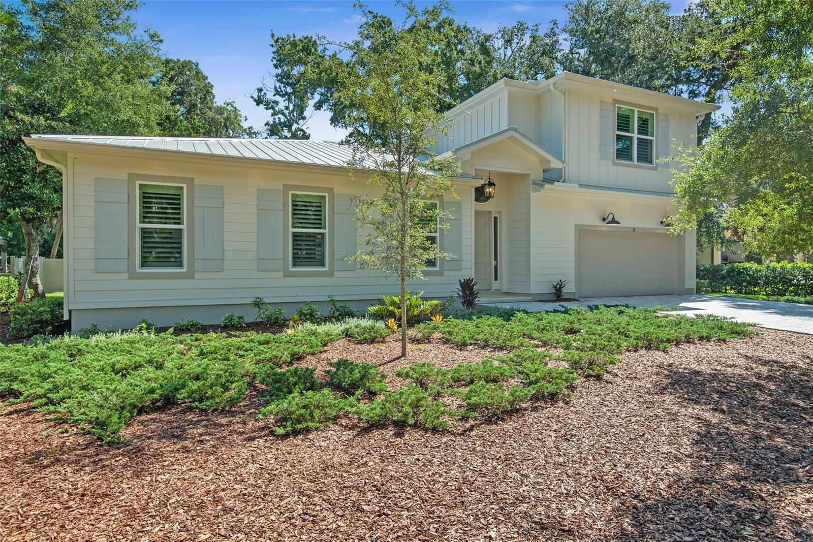 Virtually Staged. Located in the private enclave of 12 luxury coastal cottages in the desirable “Hammock Preserve” located just off Scenic A1A on the coveted Hammock Beach barrier island.Walk, bike, or golf cart just minutes to the Intracoastal Waterway & the Atlantic Ocean. NO HOA! Enjoy historic grand hardwoods & wooded quiet, no HOA restrictions, and join the ocean clubs for golf, tennis, and amenities if desired. NO RV, motorcycle, vehicle restrictions.BRING ALL OFFERS! MOTIVATED SELLER!Designer Home Features:• New custom high-end construction.• Exterior coastal superior fire resistant Hardie siding with board & batten shutters.• Galvalume wide-rib metal roof.• All Impact (Hurricane) doors and windows.• Spray foam insulation.• Tankless hot water heater.• Whole home custom plantation shutter window treatments.• Lanai porch is 305 sq. ft. & screened with Versailles pattern travertine flooring.• Paver driveway and walkway.• Florida friendly, mature landscaping with water efficient irrigation system. • 6’ privacy fence.• Open floor plan with 10’ high ceilings, custom molding and trim, & linear electric fireplace.• Solid core 8-foot interior doors throughout home.• Shiplap trim detail in main living area, entrance stairway, & master bath.• Custom cabinetry throughout. • Spacious dedicated pantry and laundry.• Locking large interior storage closet in garage.• Quartzite kitchen and bathroom countertops & backsplashes. • Fulgor Milano Italian Appliances w/Dual Fuel Range.• Luxurious master suite with spa inspired pedestal soaking tub, double walk-in shower, double quartzite vanities with LED luxury mirrors & a large custom walk-in closet.• Spacious 2nd level bedroom/bonus room with separate full bath, walk-in closet. • Pre-wired for Buyer’s dining fixture.