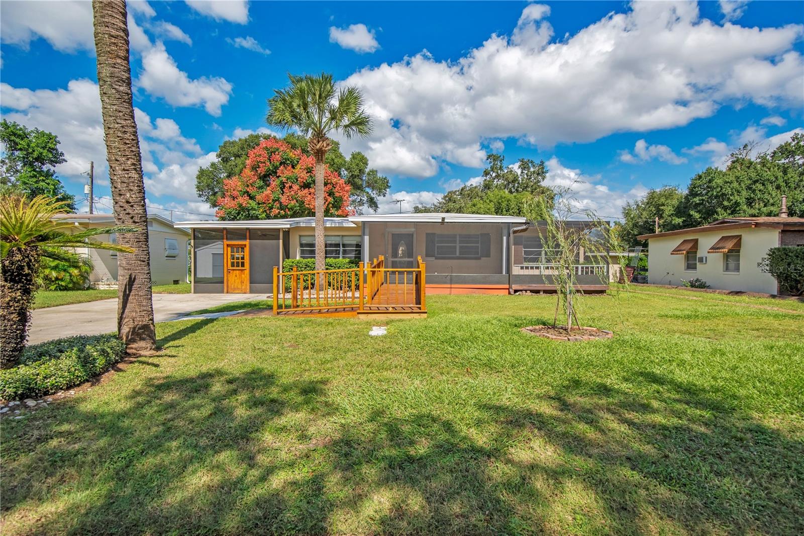 This 4 bedroom 2 1/2 bath block home has been well cared for and is located in a great school district.  There are 3 bedrooms 1/1/2 baths on one side of the home with living room and kitchen then a family room and another bedroom and bathroom added on that could be easily divided from main house if you needed a separate living space for a renter, family member, or care giver.  Nice open floorplan with brand new flooring.  Good siized yard with newer shed.  Ramps to entrances and nice screened in areas to enjoy the outdoors.