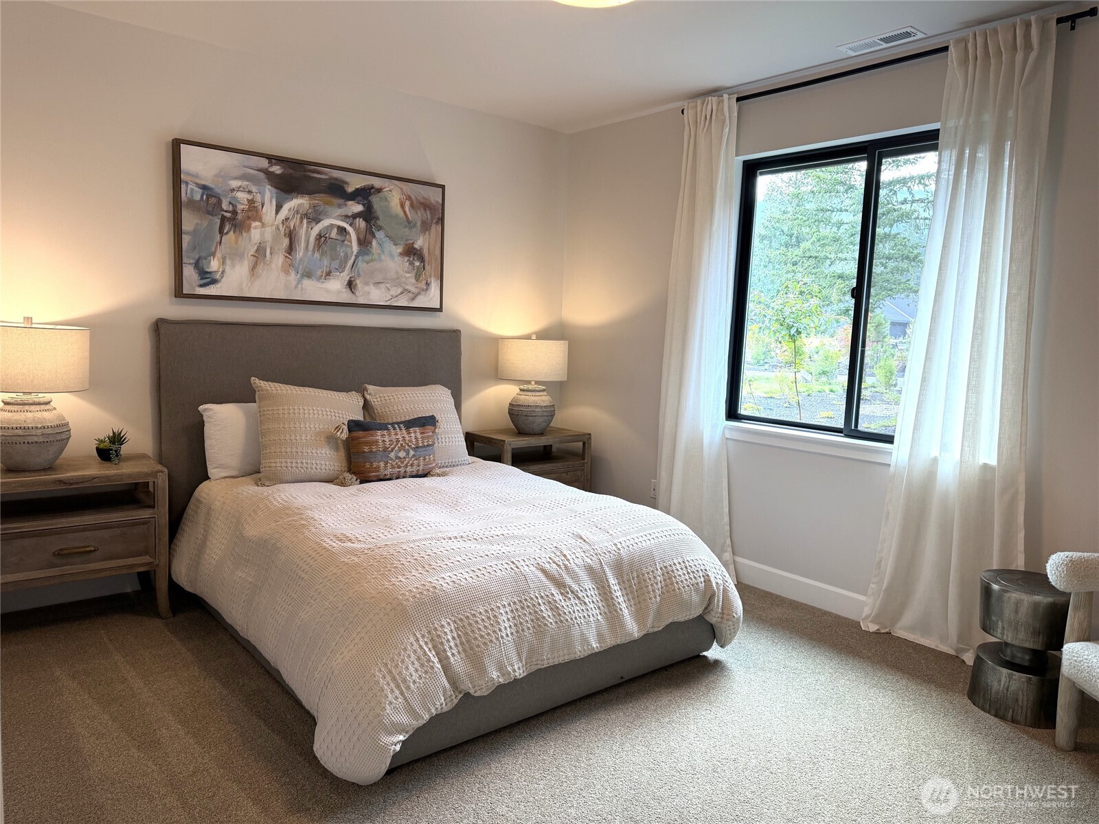 A comfortable second bedroom features its own private en-suite bath, providing your guests with a welcoming and private retreat during their stay.