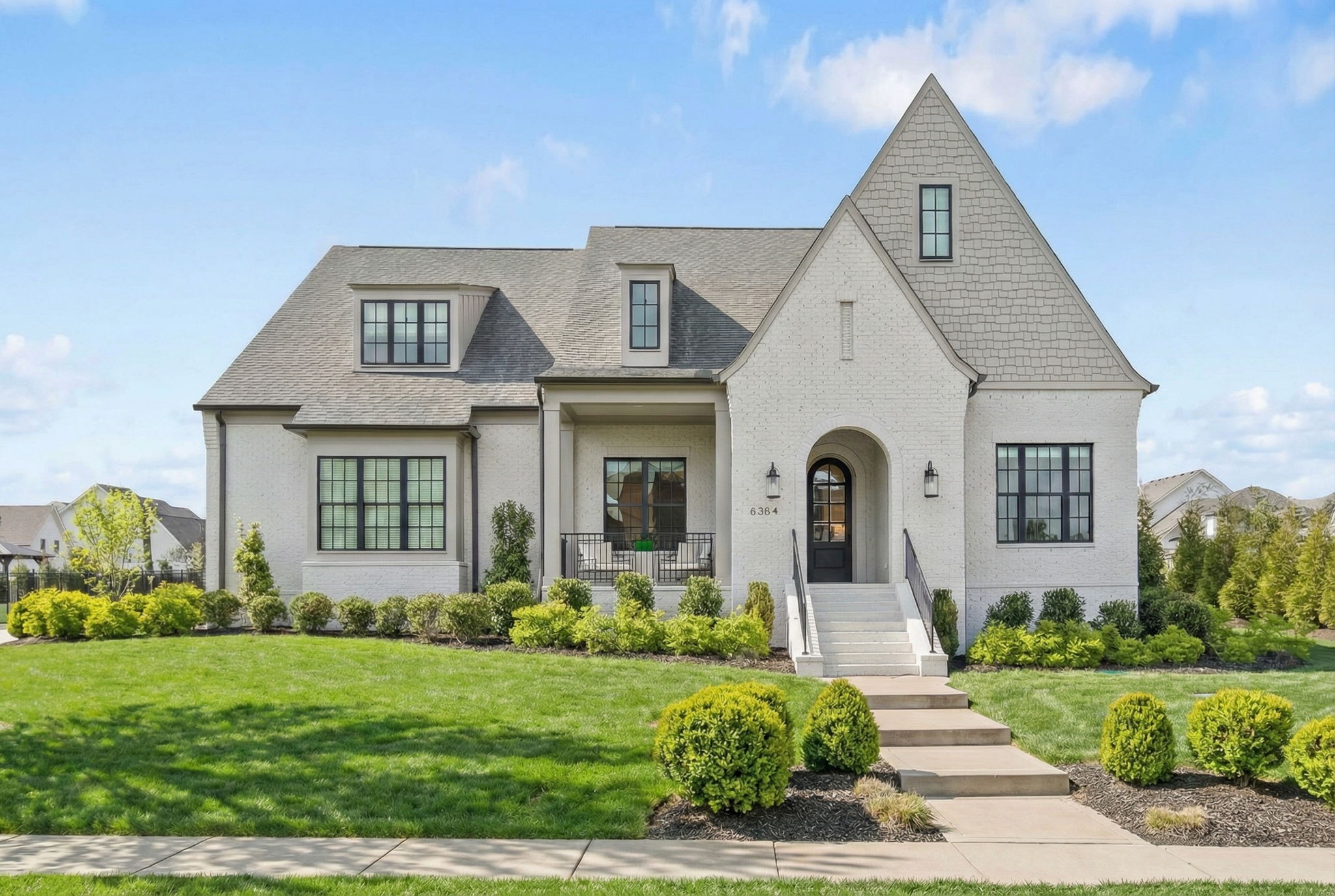 Step inside this beautiful property built by Legend Homes, designed for both daily living and unforgettable entertaining. With over 5,700 square feet, this five bedroom residence offers five full baths and two half baths, with each bedroom featuring its own private en-suite bath.The main level features three spacious bedrooms, a private office, and light-filled living spaces. The stunning kitchen anchors the home with double ovens, over-sized island, and seamless flow to the living and dining areas, ideal for hosting at any scale.The upper level continues to impress with two bedrooms, 2 and 1/2 baths,  bonus room, dedicated workout space, and theater room, offering endless options for recreation and relaxation.Outdoors, enjoy a true backyard retreat featuring a resort-style in-ground pool with a custom slide and in-ground trampoline. The covered porch is a griller’s paradise with an outdoor kitchen, fireplace, and motorized screens, creating the perfect setting for year-round entertaining.This exceptional home blends thoughtful design, luxury amenities, and effortless indoor/outdoor living in one remarkable offering.