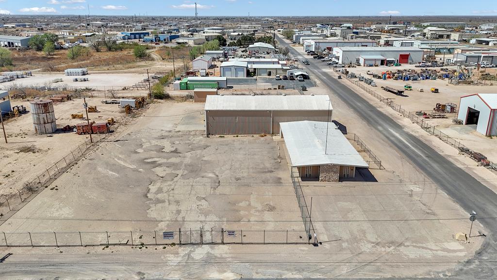 7,770 SF industrial building on 1.38 fenced, stabilized acres just outside city limits. Includes 2,430 SF potential wash bay, storage, or welding shop. Features (2) 16' OH doors, (3) 12' OH doors, and single-phase 240V power. Ideal for owner/user or investor. Great access, flexible layout, and minimal restrictions. Ready for a variety of industrial uses.