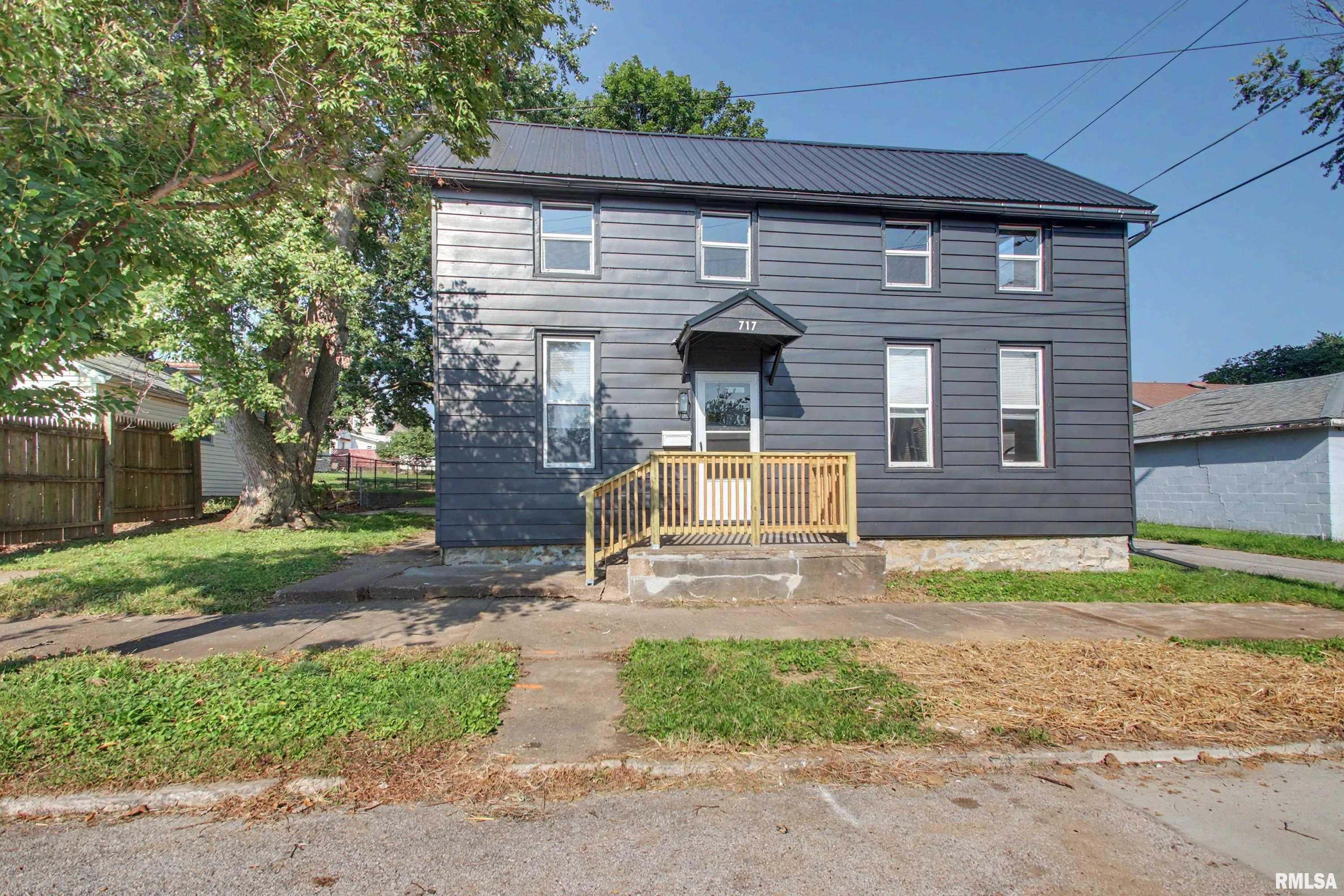 Completely renovated inside and out, this Quincy home offers extensive updates throughout! Major improvements include a new furnace and central air in 2026, new water heater, updated electrical service and breaker box, and almost all new windows, with the remaining three previously updated. Inside you'll find new flooring, fresh paint, new fixtures throughout, and convenient main-floor laundry designed for a stackable washer and dryer in the half bath. Exterior improvements include a new metal roof, front porch handrail, and a new metal storage shed in the backyard. With updates extending from the mechanical systems and electrical to the interior finishes and exterior, much of the work has already been done at 717 N 15th Street!