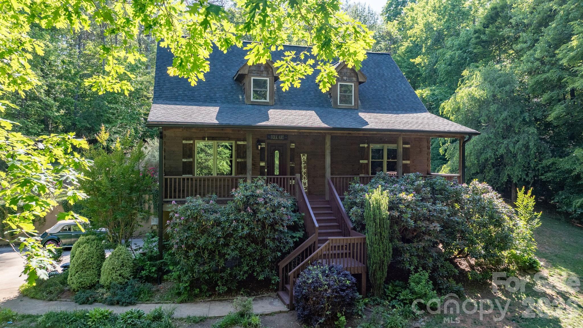 WELCOME HOME to this stunning log home retreat with a sparkling in-ground pool — just in time for summer! Nestled on a private 2.58-acre lot at the end of a long, wooded driveway, this property offers the perfect blend of rustic charm and peaceful seclusion. This home features 3 bedrooms, 2.5 bathrooms, a large bonus room, and a full basement. A full-length covered front porch welcomes you into the warm and inviting living room, complete with beautiful wood walls and flooring, plus a striking stone fireplace with gas logs. The kitchen and dining area provide the perfect gathering space for holidays, family meals, and entertaining. The main-level primary suite offers a large bedroom, walk-in closet, double vanities, a soaking tub, and separate shower. Upstairs, you’ll find two generously sized secondary bedrooms, a shared full bath, and a large bonus room ideal for a 4th bedroom, home office, playroom, or recreation space. Step outside to the covered back deck overlooking the gorgeous in-ground swimming pool — your own private oasis for relaxing or entertaining. A chicken coop is also included, adding extra charm and functionality to this unique property. Privacy, character, and outdoor living at its finest — don’t miss this one!