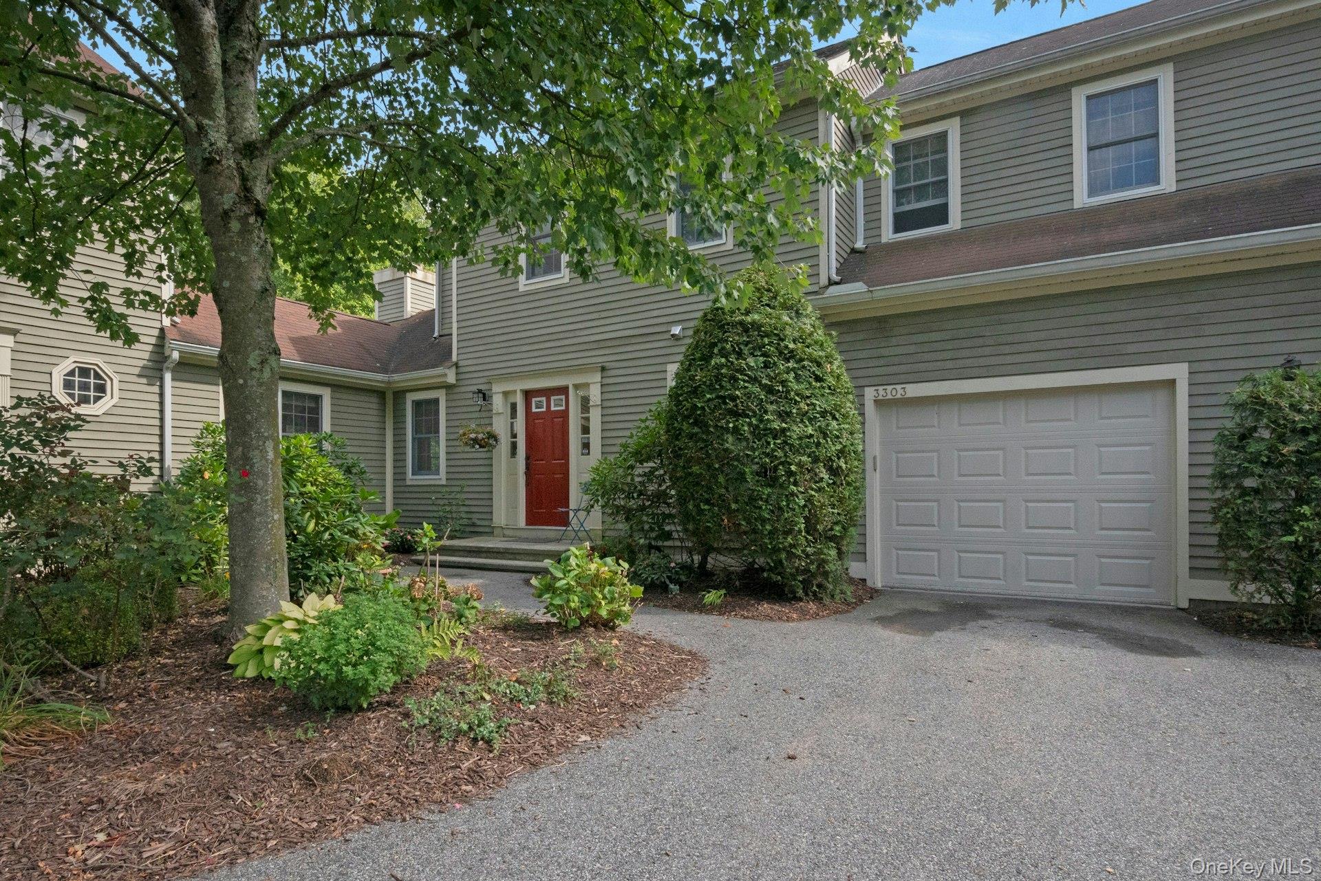 Bright and sunny corner unit Townhome in Guard Hill Manor.  2 bedrooms, 4 full baths in 2,190 sq ft. with finished walkout lower level and patio with lake views.  Living room with fireplace, Dining room with slider to deck, Eat-in kitchen with breakfast bar & slider to deck, den/3rd Bedroom, full bath and 1 car garage round out the first floor.  Second floor with main suite - WIC & bath, laundry, 2nd bedroom and hall bath.  Lower level with family room w/slider to patio, full bath, flex room and storage area.  Must see to appreciate the space!  Enjoy the outdoors with privacy and views of the lake on a cul de sac just across from the community pool, playground and tennis courts.