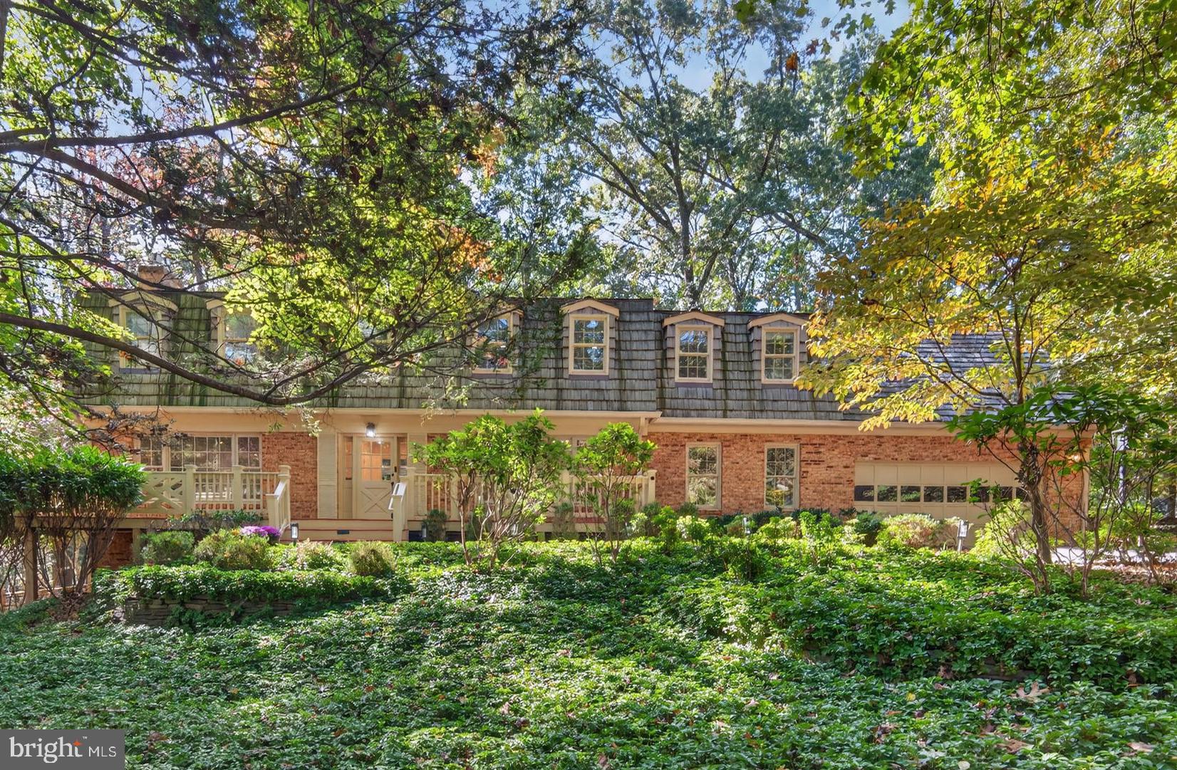 Nestled on nearly an acre of beautiful private park-like grounds surrounded by mature trees and backing to park land, this stunning 5-bedroom, 3 full and 2 half bath home w/hardwood floors throughout the main and upper levels offers the perfect blend of comfort, sophistication, privacy and natural beauty. Thoughtfully renovated and expanded over the years—including an impressive primary suite and newly renovated lower level—this residence reflects $100,000 in recent upgrades that elevate both form and function. Improvements include the renovated  lower level, new powder room w/RH vanity and fixtures, new toilets throughout, new high efficiency heat pump, new UV light air purifier for the upstairs heating unit, new washer and dryer, new Level 2 EV charger in the large two car garage w/doubled capacity electrical panel, new recessed lighting, freshly painted with low VOC Benjamin Moore paint, updated landscaping with outdoor lighting and more. The main level welcomes you with light-filled living spaces that flow effortlessly from room to room. The spacious living room connects to an expansive deck with screened-in porch that make serene indoor-outdoor living a delight—ideal for morning coffee or evening gatherings. A formal dining room (currently used as a living room) offers flexibility to suit your lifestyle, while the bright, oversized gourmet kitchen features picturesque windows overlooking the natural beauty of the treed yard.  The expansive family room (currently utilized as a home office) with gas fireplace is perfect for gatherings of friends and family. Upstairs the luxurious primary suite is a true sanctuary, complete with hardwood floors, cozy fireplace, built-ins and wet bar/beverage nook leading to the huge walk-in closet and an oversized spa bath featuring a soaking tub, dual vanities and separate shower. An additional four well sized bedrooms with hardwood floors and 2 more full baths complete this level. The lower level is designed for entertaining, boasting a newly renovated recreation room with designer gas fireplace, a custom bar with Sub-Zero fridge and wine cooler, an additional entertainment area with your own luxurious 4 person infrared sauna with red light therapy (conveys!), and room for additional storage.Step outside and discover why Reston is so beloved—55 miles of scenic walking and biking trails and over 1,300 acres of parks and open space await just beyond your doorstep. Enjoy world-class shopping, dining, and recreation, along with highly rated schools and exceptional healthcare. Reston is a walker's paradise. Leave your car at home and stroll to nearby Hunters Wood Plaza including a Safeway and neighborhood favorite Ariake Japanese restaurant. Commuters will appreciate easy access to both the Wiehle and Reston Metro Stations and to most major commuter routes and Dulles Airport.