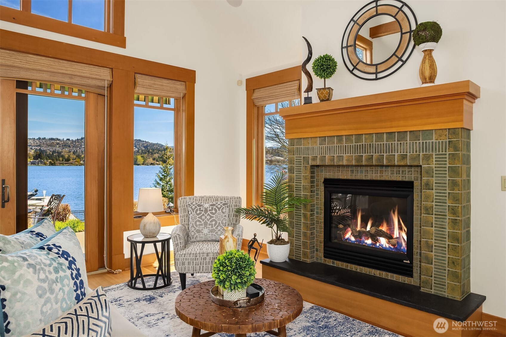 With warm fir detailing, beautifully executed tilework and sweeping lake views just steps from the shoreline, this space delivers waterfront living at its finest.