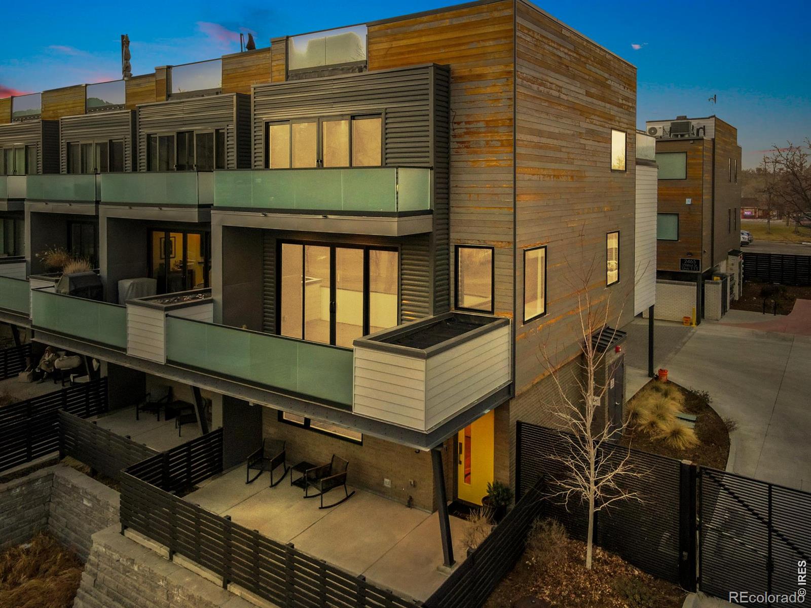 HEART OF BOULDER! 2475 Walnut Street, a rare opportunity to own a high end three bedroom, four bathroom townhome style condo in the heart of Boulder. Designed for both luxury living and effortless entertaining, this residence offers multiple outdoor spaces, premium finishes, and exceptional walkability.This thoughtfully crafted home includes two balconies, a ground level patio, and a spectacular rooftop deck showcasing breathtaking mountain views. From sunrise coffee to sunset gatherings, the rooftop retreat is ideal for entertaining with room for a hot tub, fire pit, grill station, and lounge seating.Inside, the home is finished to an exceptional standard with custom flooring, Viking appliances, a waterfall granite island, under cabinet lighting, and refined modern details throughout. The open and airy layout provides flexibility and function across multiple levels.The main floor includes a bedroom with a full bathroom, perfect for a guest suite, office, or flex space. The next level features the stunning kitchen, dining area, living room, and a convenient half bath. The living room opens directly to a private patio, creating a seamless indoor outdoor flow.The upper level offers a luxurious primary suite with a spa inspired bathroom that includes a large walk in shower and soaking garden tub, along with its own private patio. This level also includes an additional bedroom, full bathroom, and laundry area.Additional highlights include two full size parking spaces with EV hookup and a dedicated storage unit.Situated just steps from Pearl Street, this home provides unparalleled access to Boulder's best shopping, dining, entertainment, and outdoor lifestyle. Walk to CU, nearby cafes, and the new Google and Microsoft campuses while enjoying a private, elevated living experience. This is Boulder living at its finest: modern, walkable, and truly one of a kind.