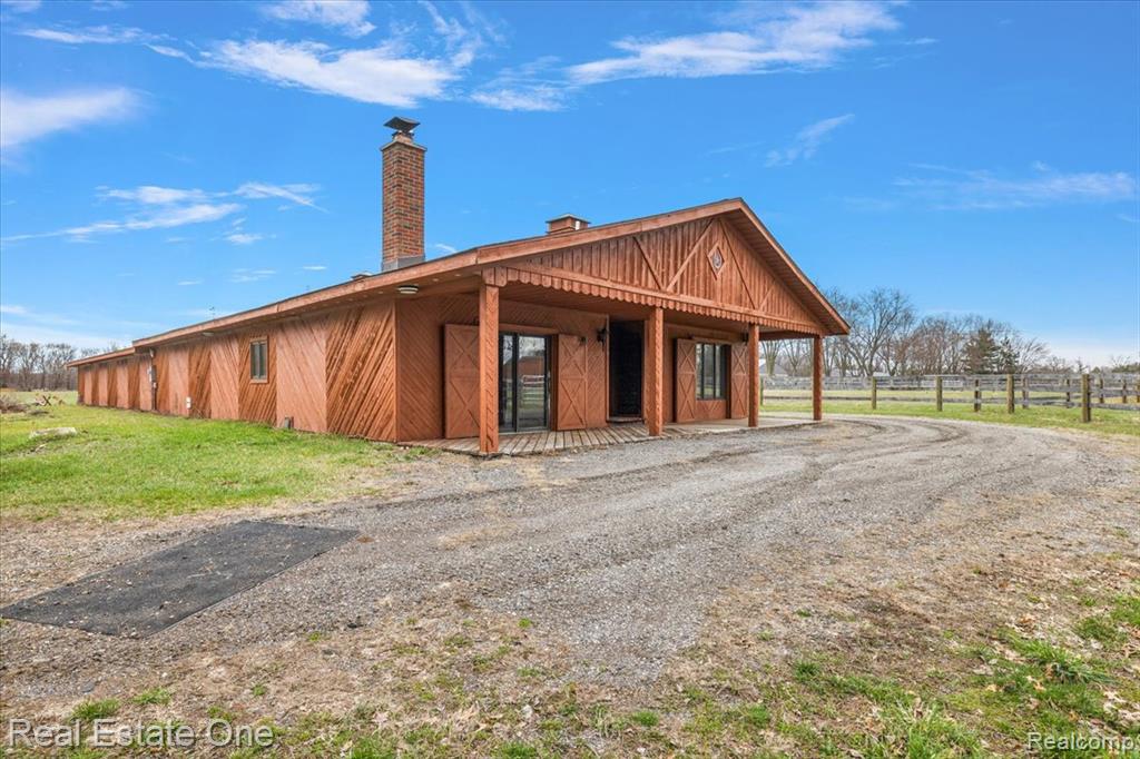 A Rare Opportunity to Own Your Own Private ParadiseSpanning over 80 acres across two parcels, this extraordinary property offers endless possibilities for recreation, relaxation, or an equestrian lifestyle.The custom-built barndominium sits on 10 acres and features a thoughtfully designed layout with a 1-bedroom living space, three horse stalls, office, multiple storage rooms, and an expansive garage accommodating over six vehicles.Outdoors, the property is equally impressive. Newly fenced pastures with run-in sheds provide ideal space for animals, while a leveled polo field area adds a unique and versatile touch. Enjoy stunning lake views and direct access to the additional 70 acres of pristine land, complete with woods, wetlands, and scenic trails that feel like your own private nature preserve.Despite its peaceful, secluded setting, this property is conveniently located near shopping, dining, and a wide variety of parks and outdoor recreation.Extensively updated within the past five years, this one-of-a-kind offering combines function, beauty, and opportunity in a truly special setting. Please do not enter the property without a confirmed appointment. Sale subject to the sale of 1050 Oxbow Lake Rd, White Lake.