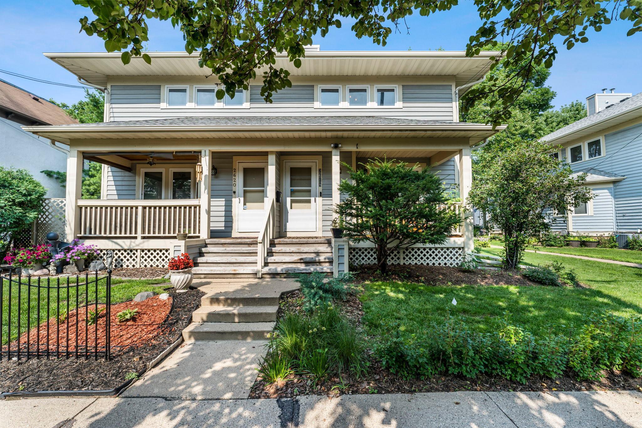 Perfectly located just minutes from the Minneapolis Institute of Art and nestled among neighborhood parks, this stylish and well-kept 3-bedroom, 2-bathroom home blends classic charm with modern comfort. Set within a quiet, professionally maintained 4-plex, it offers the best of both worlds: peaceful residential living with easy access to vibrant city amenities, including shopping, dining, and quick commutes across the Twin Cities.

Inside, timeless wood floors, tasteful architectural details, and large windows set a warm, sun-filled tone in the living room—ideal for relaxing or entertaining. The adjacent kitchen impresses with sleek Frigidaire stainless steel appliances, contemporary cabinetry, and generous counter space. A bright dining area, highlighted by a half bay window and modern light fixture, creates the perfect gathering spot.

Upstairs features two spacious bedrooms with plush carpeting and a well-appointed full bath with stylish tilework and thoughtful storage. The lower level offers a private third bedroom with walk-in closet—ideal as a primary suite—along with a beautiful ¾ bath and a finished laundry room complete with utility sink and shelving.

Outside, unwind on the charming covered front porch—your personal retreat to enjoy morning coffee or evening air. This home is a true gem that combines comfort, character, and convenience in a location that’s hard to beat.