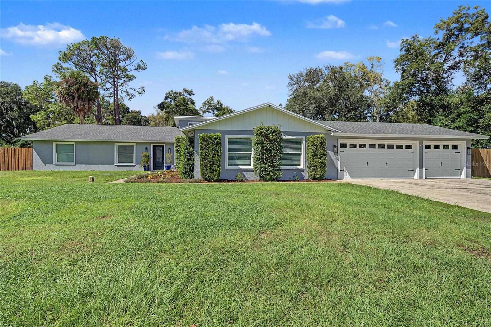 Under contract-accepting backup offers. Welcome to 19908 Jodi Drive, ideally located in the highly desirable McKitrick Elementary, Martinez Middle, and Steinbrenner High School attendance zones! Tucked away in the charming Holly Lake community of Lutz, this beautifully updated 6-bedroom, 3-bathroom pool home with a 3-car garage, and a brand-new roof to be installed prior to closing, sits on a spacious, fully fenced half-acre lot. Every inch of this exceptional property has been thoughtfully redesigned with quality finishes, attention to detail, and a perfect balance of style and functionality.From the moment you enter, you’re greeted by a bright, inviting, open-concept layout where the living spaces flow effortlessly together. At the heart of the home is a beautiful kitchen featuring custom cabinetry, striking countertops, premium appliances, and an expansive gathering space designed for entertaining. The spacious living and dining areas provide the perfect setting for hosting family and friends or simply enjoying quiet evenings at home.The primary suite offers a peaceful and comfortable retreat, featuring a beautifully updated bathroom with an oversized enclosed walk-in shower, a freestanding soaking tub, and carefully selected finishes that create a fresh, relaxing atmosphere. Five additional bedrooms offer plenty of flexibility for family, guests, a home office, or fitness room. Two additional tastefully updated bathrooms complement the home’s overall design, while a generously sized, dedicated laundry room adds everyday convenience and functionality.Step outside and discover your very own Florida retreat! The expansive screened-in lanai and sparkling private pool create the perfect setting for year-round relaxation and entertaining. Spend sunny afternoons poolside, host weekend gatherings, or unwind beneath the stars around the inviting fire pit just beyond the pool enclosure. The fully fenced half-acre property offers a wonderful combination of privacy, outdoor space, and versatility.Adding to this home’s unique charm is an established chicken coop, complete with chickens that will remain with the property! Enjoy the opportunity to gather fresh eggs when available and embrace a touch of country living while enjoying all the comforts of a beautifully updated home.Nestled in the established Holly Lake community, this property offers a peaceful neighborhood setting while remaining conveniently located near the Veterans Expressway, I-275, and I-75, with easy access to shopping, dining, entertainment, and everything the Tampa Bay area has to offer.Thoughtfully updated inside and out, this exceptional home offers the perfect blend of comfort, space, and Florida living. Welcome home to 19908 Jodi Drive!