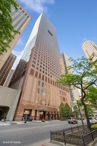 Live Large in Streeterville - 2,000 Sq. Ft. of Sunshine & Style!  Looking for that wow factor? You just found it! This super spacious 2 bed, 2 1/2 bath home in the sky is 2,000 sq. ft. of pure luxury with a fresh, modern twist. Think wide plank floors throughout, completely reimagined bathrooms, and 60 feet of south-facing windows-hello, all-day sunshine!  Massive living room (23 x 16) along with separate dining area , perfect for dinner parties or game night.  Large primary bedroom with en-suite spa bath sports double bowl sinks, separate shower and large soaking tub.  The second bedroom easily fits a king-sized bed and a WFH setup with skyline views to keep you inspired.  Closet lovers, rejoice! Four walk-in closets plus extra coat and linen space = storage goals. And the building? It's got everything: 24-hour door staff, a luxurious pool and hot tub, and a gym that actually makes you want to work out.  You're just steps from Michigan Avenue, the lakefront path, Oak Street shopping, and all the amazing eats in the Gold Coast.  Attached in-building leased parking available.  This one checks all the boxes-don't miss it!