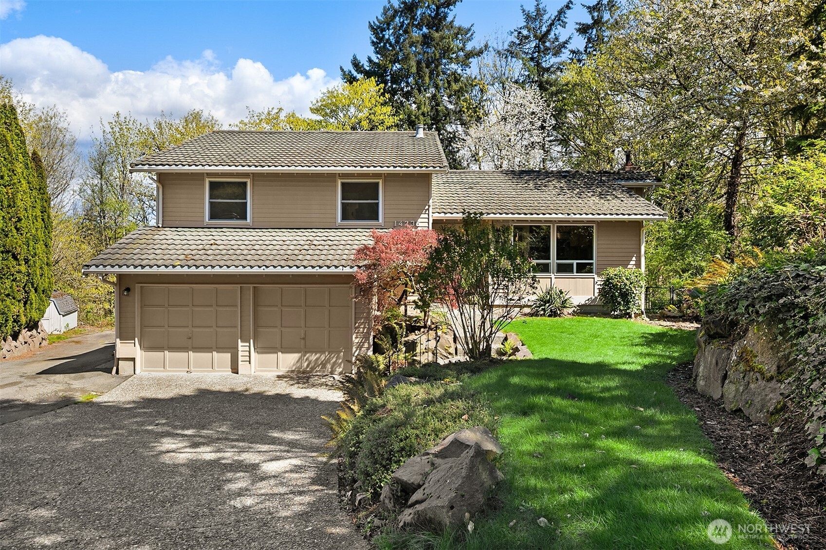 Tucked away on a private 16,880 sq ft lot, this Kirkland home backs to an 8-acre greenbelt for exceptional privacy and a serene, wooded outlook. The 2,250 sq ft, four-bedroom, 2.5-bath floor plan offers flexible living with multiple gathering spaces and options for home office, hobbies, or multigenerational needs. Storage enthusiasts will appreciate the abundant closets, utility areas, and hard-to-find extra parking for vehicles, RV, or toys. The home has been pre-inspected for peace of mind, so you can move in and start enjoying it from day one.  Live the Kirkland lifestyle with quick access to top-rated schools, major Eastside employers, and commuter routes. Enjoy nearby parks, trails, and Lake Washington waterfront just minutes away, plus a vibrant local scene of shops, cafes, and restaurants in downtown Kirkland. The perfect blend of privacy, convenience, and everyday livability in one of the Eastside’s most sought-after cities.