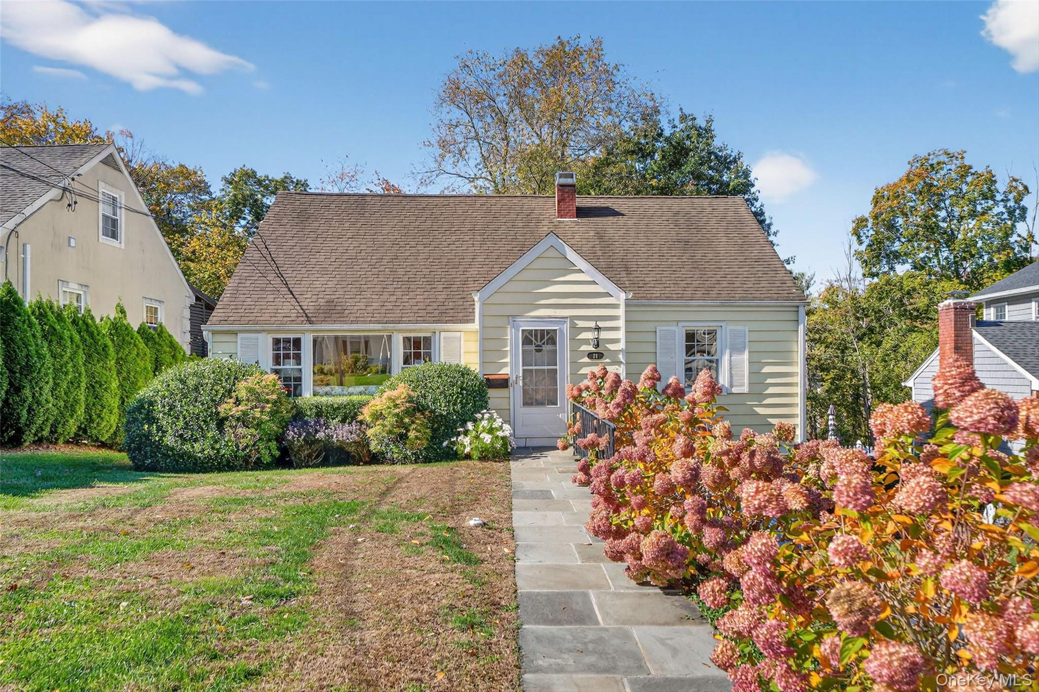 AND THEY LIVED HAPPILY EVER AFTER! Impeccably maintained by the same family for nearly 50 years, this picture-perfect storybook cape awaits its new owners. Warm and inviting the moment you arrive, this home offers four generously sized bedrooms and two full bathrooms, providing flexibility for guests, work-from-home needs, or multigenerational living.

A large eat-in kitchen opens seamlessly to the dining area and the family room, which features a vaulted ceiling with wood beams, a skylight, and a wall of windows making the area sun-drenched, inviting, and warm. Hardwood floors flow throughout, creating a timeless and cohesive feel.

Step outside to a spacious deck designed for entertaining, overlooking a fantastic backyard with room for gardens, play, and outdoor dining. Storage is impressive, with closets everywhere including walk-in options, plus an oversized basement with even more space to organize or finish in the future. New windows and a one-car attached garage complete the picture.

This home truly gives you all the space you need to live, work, play, and entertain, both inside and out, paired with the everyday convenience you’ve been searching for. Fast access to major highways and transportation, fine dining, shopping, recreation, and local culture right in your own backyard. Walk to Metro-North RR, nearby Northern Westchester Hospital, and just minutes from Westchester County Airport. Mount Kisco: where convenience meets community! WELCOME HOME!