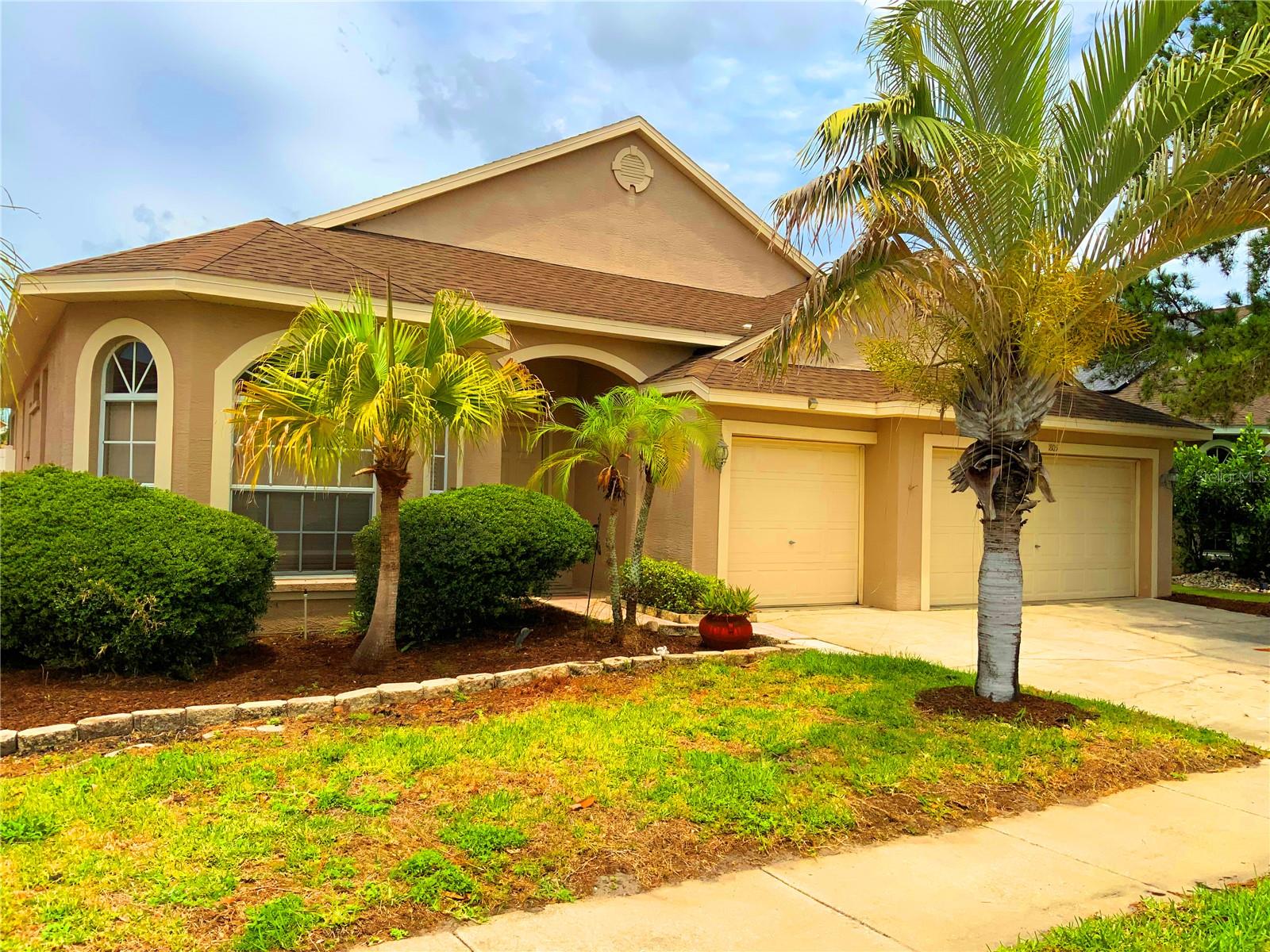 Beautiful Contemporary Home in Desirable Forest Ridge Gated Community.  Built in 2000, this beautiful homehas. A 3 Car Garage   4 Bedrooms and 2 1/2  Baths along with a Beautiful covered Pool for Family Enjoyment!The large Family Room is highlighted by a wood burning fireplace.    The Master Bedroom features His andHer Vanities and a Garden Tub for Luxurious Baths! This Gated Community provides access to ConvenientShopping, Restaurants and the many scenic features of the Tarpon Springs like the unique Sponge tables!Docks, boating, local small storybook style towns, high-end shopping, excellent, Airports as well as theproximity of being near many of the Best Beaches in Florida! About an hour and a half from Disney World. Excellent area for new families. As well as many of the new Floridian favorite destinations.