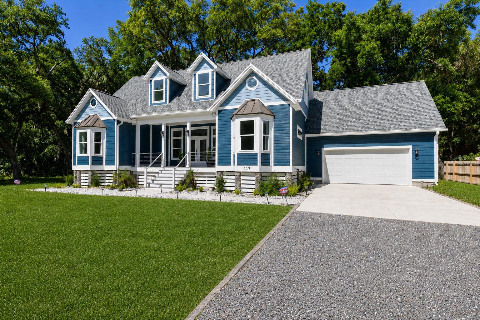 Virtually Staged. Located in a rare piece of Olde Florida with majestic oak trees, this new construction homeoffers all the modern conveniences with over 3,500 sq ft under roof. Ideally located just a couplehundred feet from the Intracoastal Waterway and within walking distance to the beach, greatrestaurants, trails, and Publix. Please watch the virtual tour for a better view into this stunningproperty.Designed for both comfort and versatility, this 2-story home features 4 bedrooms and 3 fullbathrooms. On the first floor you'll find an open floor plan with a designer kitchen, eating area,and living space which leads to an expansive deck. The kitchen is well appointed with premiumappliances, sleek quartz countertops, and custom Stella cabinetry with under and over cabinetlighting. The light and bright open area is grounded with a striking staircase and fireplace. Thebedrooms are split with an ensuite bedroom on one side and two bedrooms sharing a guestbath on the other.The second-floor is a true suite complete with its own kitchenette, fireplace, spa-like bathroom,bedroom, walk-in closet, study nooks, and a spacious upstairs flex room. Perfect forentertaining, a media lounge, or home office. Ideal for multi-generational living or long termguests.Expansive outdoor living areas include a welcoming covered front porch and an open rear deckto enjoy the coastal breeze. Additional highlights include premium impact-resistant windows anddoors, a 600 sq ft driveway, oversized two-car garage with loft storage which can be convertedto additional living space. The neighboring parcel is also available for sale. The location is unique, close to the charming towns of Flagler Beach and St. Augustine with anarray of restaurants and live music. Enjoy small town living while being tucked between Daytonaand St. Augustine and only a short drive from Jacksonville and Orlando. Don't miss this rareopportunity to own a newly constructed luxury coastal home in an unbeatable location wherecraftsmanship, style, and lifestyle come together seamlessly.Feature Sheet available for more highlights and upgrades.