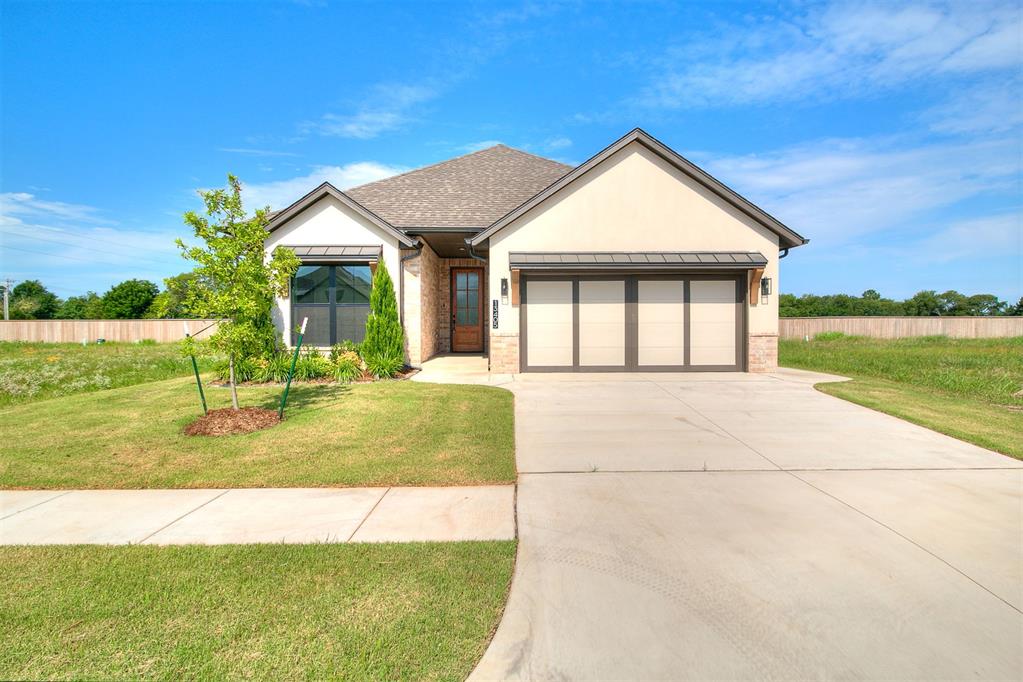 THIS HOME HAS EVERYTHING! This beautiful new construction home in a gated community features 3 bedrooms, 2 bathrooms, 2 car garage, custom built shaker cabinetry with soft close doors and full extension drawers. The open kitchen contains cabinets to ceiling, custom lighting package, Whirlpool appliance package and wood-look tile in common areas. The covered back patio features an outdoor fireplace. Other highlights include a smart security system, tankless water heater, decorative tile in the laundry room. $10,000 BUILDER INCENTIVE TO BE USED TOWARDS UPGRADES, CLOSING COSTS OR RATE BUY DOWN.