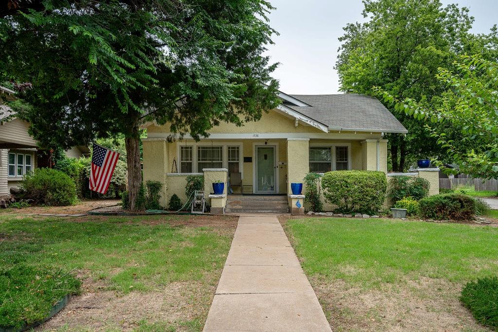 Charming home located in the heart of the highly sought-after Putnam Heights neighborhood! This inviting property seamlessly blends historic charm with modern conveniences, featuring spacious rooms, abundant natural light, and classic architectural details throughout. Situated on an attractive corner lot, you'll appreciate the mature trees, landscaped yard, and delightful curb appeal. The detached guest house is currently occupied by a tenant, bringing in $600 per month—ideal for supplemental income or multigenerational living. Enjoy peace of mind with a concrete, steel-reinforced basement that conveniently houses laundry facilities and doubles as a storm shelter. A two-car detached garage sits conveniently between the main home and guest house, and the beautifully designed gazebo area creates a marvelous outdoor living space perfect for entertaining or relaxing. Perfectly positioned close to the vibrant Paseo Arts District, Asian District, and Midtown, this home provides convenient access to restaurants, shopping, entertainment, and parks. Ideal for those seeking a timeless property with character, comfort, and added income potential—don't miss your chance to own a piece of historic OKC!