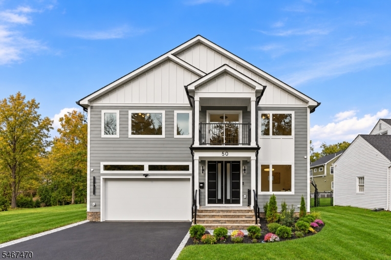 Discover an extraordinary NEW CONSTRUCTION in a prime Livingston location, offering 5,092 sq ft across 3 finished levels-including garage on a flat 0.20-acre lot. This stunning 6 Bedroom, 5.5 Bath residence showcases exceptional craftsmanship, luxurious finishes & modern elegance. A dramatic 2-story foyer welcomes you into a sun-filled interior w/ 10-ft first-floor ceilings. The spectacular family room features soaring 20-ft ceilings, sleek tiled fireplace, built-in speakers & sliding doors to a patio & fully fenced-in backyard. The gourmet kitchen boasts THERMADOR appliances, custom white & oak cabinetry, oversized island & walk-in pantry. An elegant dining room w/ built-in bar is perfect for entertaining. A private 1st-floor ensuite Bedroom offers versatility as a guest suite or home office. Upstairs, 9-ft ceilings, elegant tray ceilings & WICs enhance EVERY Bedroom. The luxurious primary suite offers dual WICs, private balcony & spa-inspired bath. Three additional bedrooms, a second balcony overlooking the front of the home & laundry complete the 2nd floor. The finished Lower Level w/ 9-ft ceilings features a spacious recreation room w/ speakers, wet bar, bedroom & full bath. Additional highlights include a 2-car garage, EV charger outlet, smart home features & 10-Year Builder's Warranty. Luxury living meets exceptional everyday convenience!