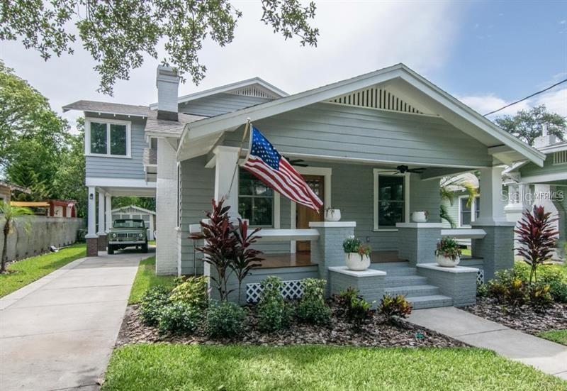 Welcome to Historic Hyde Park. This beautiful 3-bedroom, 3.5-bath historic bungalow was thoughtfully renovated down to the studs in 2016, seamlessly blending its original charm with modern updates and finishes. A new AC system installed in 2026 adds to the home's many improvements. The spacious front porch welcomes you into a home filled with natural light from double-pane windows and an open, flowing floor plan designed for comfortable everyday living and entertaining.The main level features a sitting area accented by a fireplace, a formal dining room with built-ins, a private bedroom and bathroom wing, a beautifully appointed kitchen, family room, wet bar, and half bath. The kitchen is an entertainer's dream, featuring Viking appliances, a gas range, quartz countertops, ample cabinetry, and a center island offering additional storage and gathering space. A centrally located wet bar with a wine refrigerator complements the entertaining spaces. Toward the rear of the home, a casual dining area and spacious family room provide additional room to relax and gather. Both downstairs bathrooms have been tastefully updated with marble flooring, vanities, and fixtures.Upstairs, the spacious primary suite features a beautifully renovated bathroom with marble finishes throughout, dual vanities, a private water closet, and a separate makeup area. The walk-in closet offers customized organization and storage. An additional bedroom, full bathroom, laundry closet, and versatile loft that can serve as a home office, gym, or additional living space complete the second floor.The covered back porch overlooks an expansive backyard with plenty of space for outdoor entertaining and the potential to add a pool. The exceptionally long driveway provides ample off-street parking for up to six vehicles, a desirable feature in Historic Hyde Park. A covered carport and enclosed workshop/storage shed offer additional convenience and functionality.Ideally located in the heart of one of Tampa's most sought-after neighborhoods, this home is within walking distance of Hyde Park Village, Bayshore Boulevard, and the dining, shopping, and entertainment of SOHO. Downtown Tampa and Tampa International Airport are also just a short drive away.With its extensive renovation, thoughtful layout, generous outdoor space, and prime Hyde Park location, this home offers a wonderful opportunity to enjoy one of Tampa's most established and desirable neighborhoods.