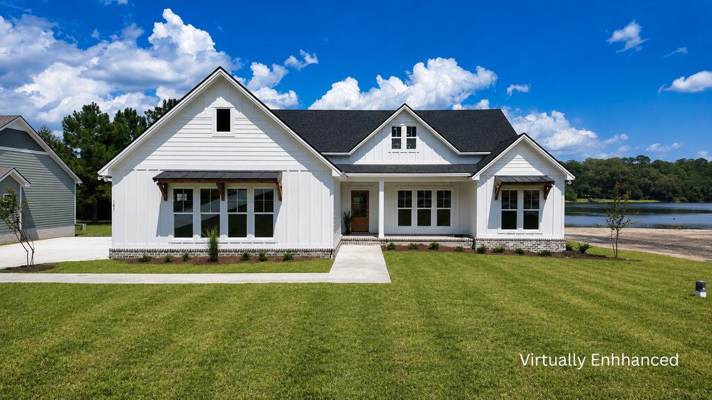 Waterfront on 100 acre lake. Brand new 4-bedroom, 2.5-bath home located in the spectacular Lake Riverside subdivision right on the water! Enjoy all the benefits of new construction, thoughtfully designed with modern finishes, a functional floor plan, and low-maintenance living from day one. With vaulted and trey ceilings, beautiful wooden beams, built-in bookcases, wainscotting, and paneling, it's all in the details in this showstopper property. Inside, the beautifully appointed kitchen is the heart of the home, offering brand new stainless steel appliances and an oversized island while remaining open to the spacious living area. Large windows overlooking the breathtaking lakeside view invite a welcoming bright and airy atmosphere to the living area. The primary suite offers a true relaxing retreat with double vanities, a luxurious walk-in shower, a garden tub, and an oversized walk-in closet. The layout of the primary suite is designed to perfection with the primary bathroom connecting to a huge walk-in closet that connects to the laundry room. On the opposite side of the home, three additional bedrooms provide plenty of flexibility for children, guests, a home office, or hobbies. You'll love afternoons on the back screened-in porch watching the sunset. For those looking for a breath of fresh air, you'll love having the peace and privacy of country living while being just 20 minutes from historic downtown Thomasville. This home is ready to welcome its very first owners so don't miss out on this incredible opportunity to experience the quality and peace of mind that come with new construction.