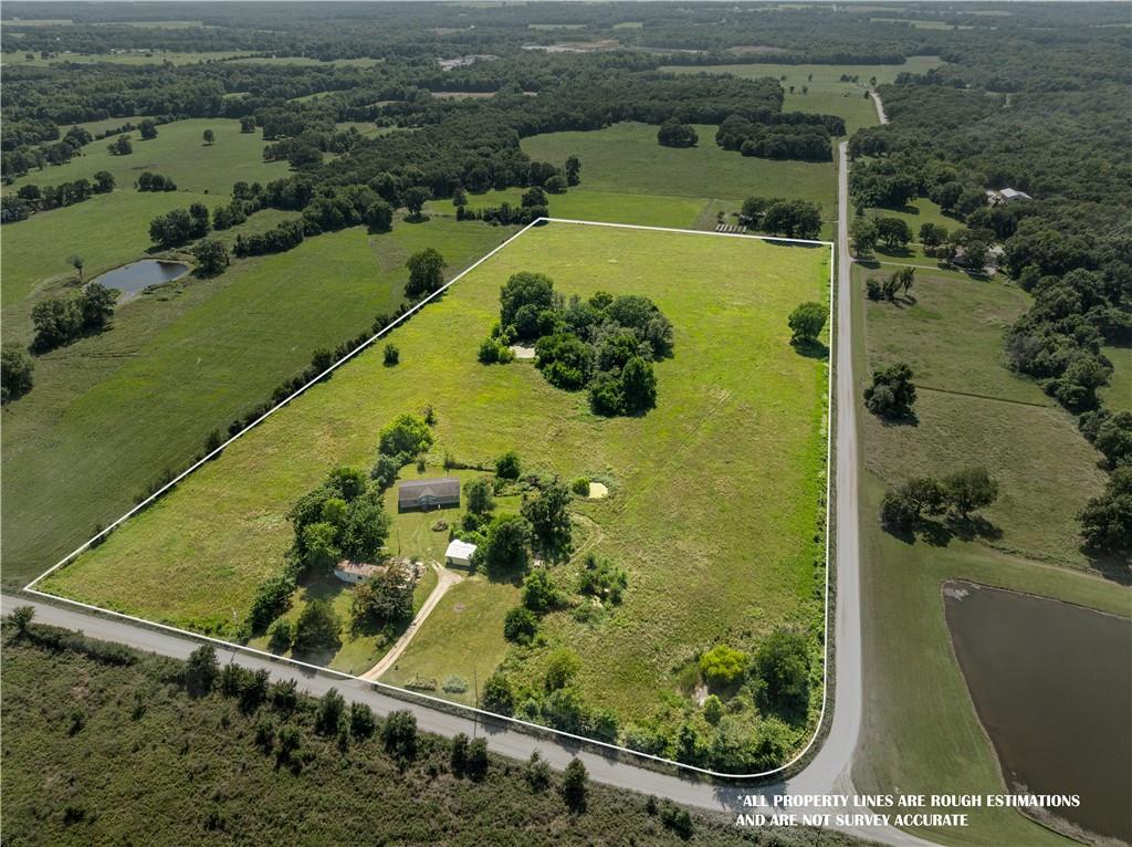 There are two homes on these 20 ACRES of scenic beauty.

The property offers the perfect blend of modern convenience and potential for customizing to your tastes. The main attraction is a spacious four-bedroom, two-bathroom manufactured home, boasting contemporary design and ample living space for your family. A kitchen with stainless steel appliances at the heart of the home will be a delight come mealtime!

Additionally, this property includes a separate three-bedroom, two-bathroom dwelling with a stunning patio and an oversized detached garage/workshop, providing endless opportunities for DIY projects or extra storage space. Imagine enjoying your morning coffee on the patio, overlooking the lush conservation land and majestic, whispering trees that surround you.

If you've been searching for a serene escape from the hustle and bustle of city life, look no further. With this property, you can enjoy the peace and tranquility of nature while still being just a short drive away from essential amenities. Homes are serviced by well water (Well is 427 feet deep and dug in 1982. New pump installed in 2012) Homes heating and cooling are provided by ground source heat pumps. Water is also conditioned by a water softener)


Don't miss out on this rare opportunity to own your own private oasis - schedule a showing today and make this dream a reality!