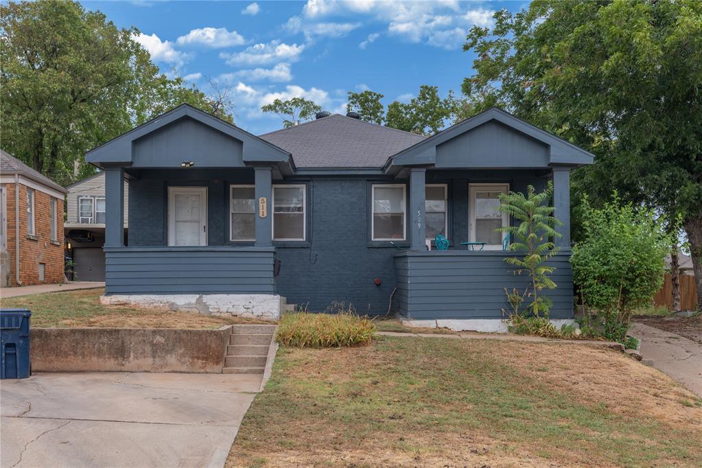This duplex delivers an incredible opportunity for investors near the vibrant Paseo Arts District and Uptown 23rd. Both units feature identical, character-filled layouts framed by rich stained wood flooring, sunlit windows, and a focal decorative fireplace flanked by charming built-in shelving. Unit 509 provides immediate income as it is currently leased out, while Unit 911 is completely move-in ready and freshly updated with crisp interior paint—making it ideal for an owner-occupant or a quick tenant placement. Complete with a shared driveway, ample parking space, and a generous common backyard, this versatile income property combines historic charm, and exceptional proximity to local dining, shopping, and entertainment—reach out today to schedule your private tour!