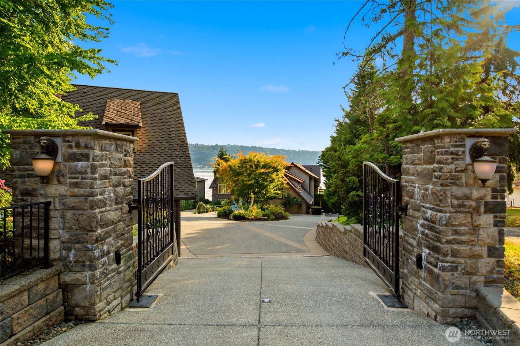 Private gated entrance welcomes you to one of Lake Sammamish's premier waterfront estates.