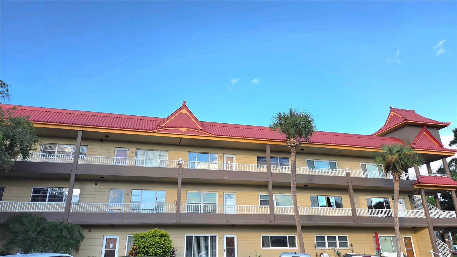 Come and see this top floor unit where you will never hear footsteps again.  This unit needs some updating so you can remodel your way and is in move-in condition.  The AC is 10 years old.  Meet new friends and neighbors at the community pool.  There are many planned activities and a bus runs through the community to the mall.  55+, land-leased, large pets are ok.